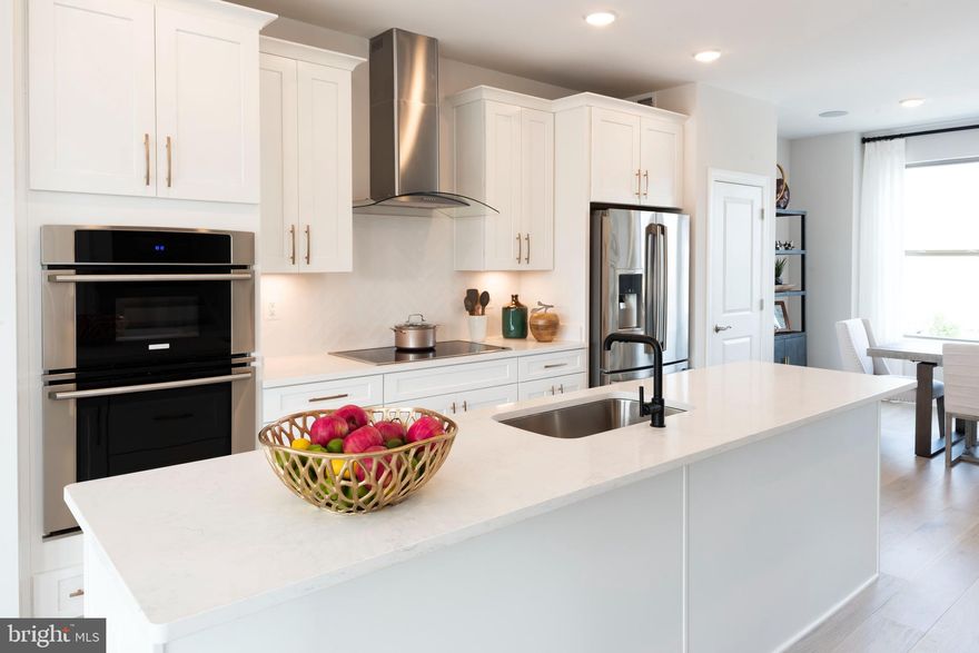 The Maya home design is all about flexibility. Homesite 411 is a 3-4 bedroom townhome featuring an open-concept floor plan with enhanced finishes, an expansive island that seats up to six, and generous walk in closets  A large, yet cozy family room and dining area make this space feel complete. Relax and take in the sky view from your oversized deck and entertain on your expansive main floor featuring 10 ft. ceilings. At the end of the day, retreat to your owner's suite with a private en-suite bath. The room may become your favorite and will certainly inspire you to put your feet up and relax. Imagine watching the sunset in a community surrounded by the Potomac River. Potomac Shores is unparalleled when it comes to amenities. Experience the endless opportunities to bike, walk, run, swim, golf, workout, canoe, boat, or enjoy a seat in front of the firepit at the Golf Club restaurant open to all Potomac Shores residents. Walk throughout the tree lined community on over 85 miles of wide paved trails. Take the VRE train (projected 2023) to D.C. then back to the future town center on the water. Enjoy the convenience of two of the three brand new schools that have been completed. *PHOTOS ARE OF A SIMILAR HOME.* We are currently following CDC and State guidelines regarding COVID-19.Public:**The price for this home lists the base price, and structural options cost. Design features HAVE NOT YET BEEN added to this home, the final price will increase with the addition of Smart Select features.  for approximate additional cost on our new listings.