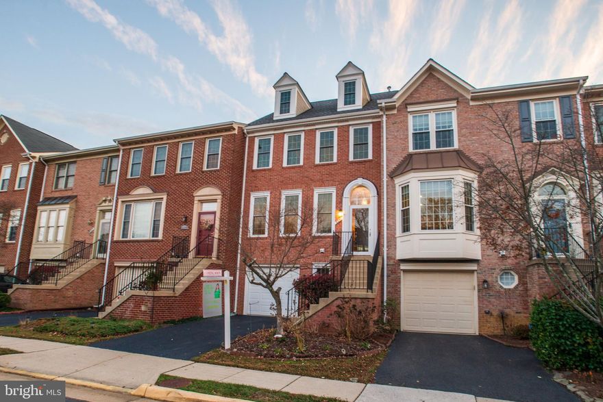 Welcome to 6231 Windham Hill Run,  an elegant townhome on one of the most premium, tree-lined streets in Kingstowne! This beautiful residence features hardwood floors in an expansive living room, a gourmet kitchen with tiled backsplash, stainless steel appliances, and granite countertops. An added bonus on the main level is a deck off the dining area overlooking a tranquil wooded area. Upstairs, you'll find a master suite with a large walk-in closet and stunning vaulted ceilings, plus master bath with soaking tub. Don't miss an attic with flooring on the fourth level (a RARE find in Kingstowne) that's perfect for all of your storage needs. A lower level with a three-sided fireplace offers another opportunity to walk out to a patio with a peaceful treed vista. Windham Hill Run is ideally located minutes from two metros, 95/395, numerous Kingstowne restaurant and retail offerings, Wegman's and Springfield Mall. Schedule a tour today!