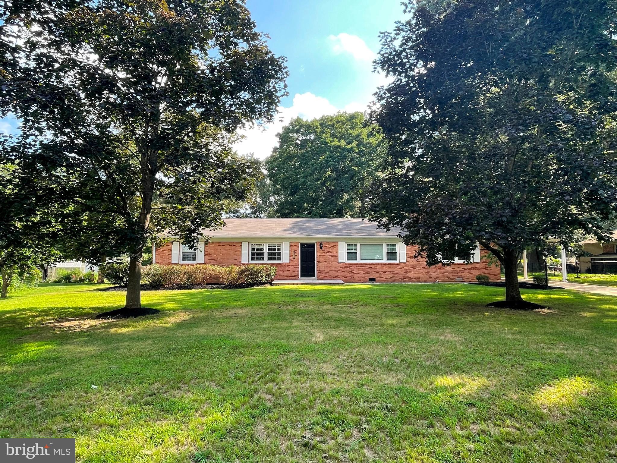 SINGLE LEVEL LIVING AT ITS BEST in this updated 3BR 2FB all brick rambler! Upon Entering the home through the front entry foyer you are offered immediate views through the home to the rear yard as well as the large living room with wood burning fireplace. The upscale Kitchen features 42" cherry cabinets, quartz counter tops, ceramic floor, double oven, stainless appliances, ceramic back splash and breakfast bar. The Dining room with sliding glass door with integrated blinds opening to the rear patio area overlooking the large rear yard. Off of the Kitchen area are the Family room with access to the carport and the adjacent laundry area. The home is located on a quiet no-through street in an established neighborhood, yet conveniently located allowing easy access the many amenities offered by the White Plains, La Plata and Waldorf areas.