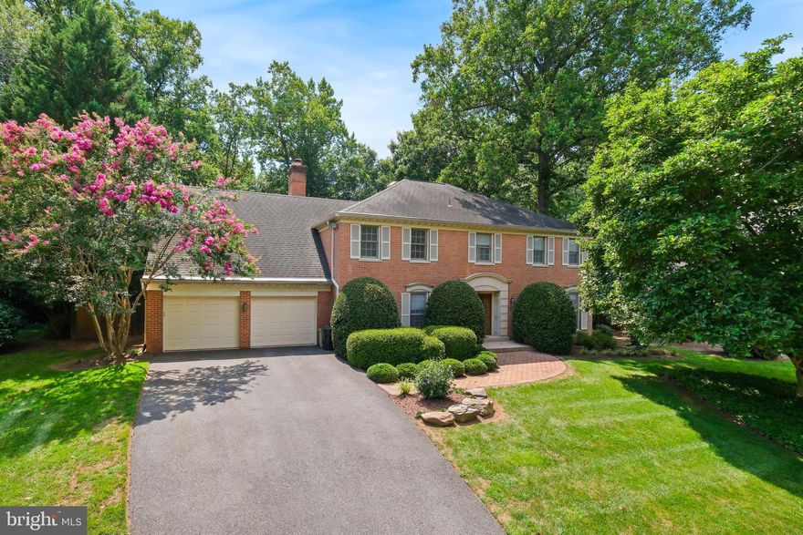 A Rare Opportunity in Coveted Windermere | North Bethesda

Welcome to this beautifully maintained all-brick residence tucked away on a quiet, tree-lined street in the highly sought-after Windermere community of North Bethesda. Set on a beautifully landscaped lot, this expansive home offers 6 bedrooms, 4 full baths, and 2 half baths across a bright and thoughtfully designed layout—perfect for modern living and gracious entertaining.

Step inside to a marble foyer that sets the tone for the elegant interiors beyond. Hardwood floors and recessed lighting flow throughout, creating a warm and inviting ambiance. The original owners thoughtfully expanded the home with a 13-foot rear extension across the main level, allowing the kitchen, dining room, and family room to span an impressive 27–30 feet each—flooded with natural light and framed by views of the surrounding trees.

The heart of the home is the sunlit kitchen, which offers abundant space for cooking and casual dining. Adjacent, the family room invites relaxation with its natural gas stone fireplace and flows seamlessly into a soaring sunroom with dual skylights—an ideal space for quiet mornings or cozy evenings. The formal dining room, with its extended proportions, is ready to host gatherings large or small. Additional main-level highlights include a classic living room and a handsome library with custom built-ins. A two-car garage conveniently enters through the laundry room.

Upstairs, hardwood flooring and recessed lighting continue throughout. Five generously sized bedrooms and three full baths provide flexibility for families of all sizes. The spacious primary suite is a private retreat with a large sleeping area, multiple closets, a dressing area, and a well-appointed bath.

The finished lower level adds even more versatility, featuring a large open space currently used as a fitness studio—easily adaptable as a playroom, rec room, or guest lounge. You'll also find a sixth bedroom with a full bath and a separate enclosed storage room housing the HVAC system and water heater.

Outside, the backyard is a true showstopper. Enjoy your own resort-style escape with a sparkling in-ground pool, attached Jacuzzi, a spacious raised deck, and a dedicated poolside bathroom. Surrounded by mature trees and a fully fenced yard, this private outdoor oasis is perfect for summer entertaining or peaceful everyday living.

Located just minutes from an array of shopping, dining, and entertainment—including Montgomery Mall, Pike & Rose, Cabin John Park, Strathmore Music Center, and Cabin John Shopping Center—this home also offers convenient access to I-495, I-270, Grosvenor Metro, and top-rated Montgomery County schools.

Don't miss this rare opportunity to own a beautifully expanded and meticulously maintained home in one of North Bethesda's most desirable communities.