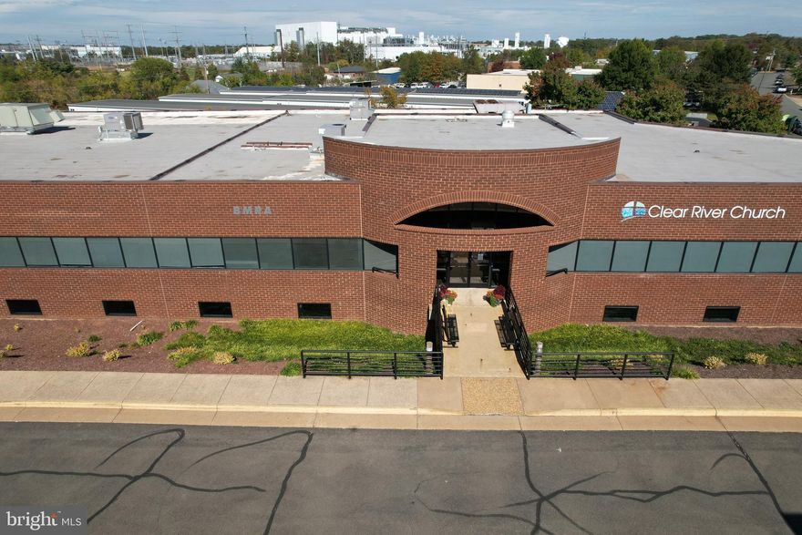 This 8,152 SF flex office condo features a functional mix of private offices, open work areas, conference rooms, kitchen, and storage. The well-maintained space is zoned Industrial but offers a professional image and provides a turnkey environment suitable for a variety of office or light flex users. The unit includes a Brivo Security system, a secure room for classified materials, furnished offices if desired, 20 reserved parking spaces, and additional unreserved parking available in the shared lot. Churches allowed with a Special Use Permit only.  Showings restricted to Mondays or Fridays.
Conveniently located along Godwin Drive in the City of Manassas, the property offers excellent access to Rt. 28, Rt. 234/Prince William Parkway, and I-66 for easy commuting throughout Northern Virginia. Surrounded by a mix of professional offices, service businesses, and light industrial users, the area provides a balanced business environment with nearby retail, dining, and amenities. The property is also just minutes from Old Town Manassas, VRE Station, Innovation Park, GMU SciTech Campus, & Manassas Regional Airport.