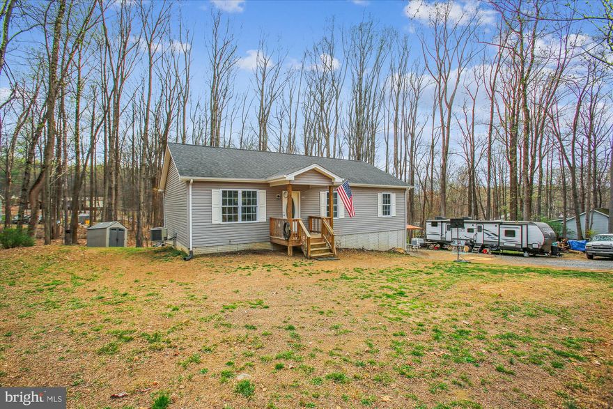 The Sellers are accepting back up offers.
Escape to the Outdoors—Adventure Awaits in Shannondale!

If you crave fresh mountain air, starry night skies, and endless outdoor adventures, this is the home for you! Nestled in the heart of Shannondale, this property is just around the corner from the Mountain Lake Club, where you can spend your days kayaking, swimming, and soaking in the beauty of West Virginia living.

This charming three-bedroom, two-bath home is the perfect basecamp for all your adventures. Inside, you’ll find a warm and inviting space, with plenty of room to relax after a day of hiking or fishing. The partially finished basement offers a spacious recreation room, and the one-car garage provides great storage for all your outdoor gear. Looking to add value? The unfinished portion already has rough plumbing and framing for an additional bathroom, giving you the perfect opportunity to build equity while making it your own.

Bring the camper, the kayaks, and your adventurous spirit—this is more than just a home; it’s a lifestyle. Get outdoors and start living the mountain dream!