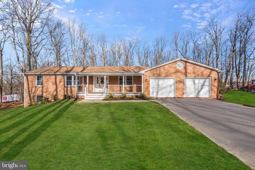 Come see this beautifully updated home nestled on a private 2+ acre treed lot. This brick 5-bedroom, 4.5-bath residence boasts a spacious open layout, with luxury vinyl plank flooring and freshly painted interiors creating a modern ambiance throughout.

The gourmet kitchen, overlooking the living and dining areas, showcases new white cabinets, quartz countertops, and a stainless steel island hood, along with brand-new stainless steel appliances. A pantry and a new laundry room, as well as a half bath, are conveniently located off the kitchen.

The expansive living room offers serene views of the wooded lot, providing ample space for various forms of entertainment. The first floor features a primary bedroom with a large ensuite bathroom that includes a new glass shower. Additionally, two sizable bedrooms share a beautifully tiled bathroom.

The English basement, accessible from both the backyard and the kitchen, features an office, a playroom/exercise room, space for a pool table or bar, and a recreation room. Two large bedrooms each have their own private newly tiled bathrooms. The property also boasts new windows throughout, a new roof and gutters, all-new appliances, a new water heater, and a new washer/dryer.

This updated home offers all the modern HGTV updates and provides a tranquil retreat on its spacious lot. Don't miss the opportunity to experience this remarkable property at the open house on Saturday, December 16th, from 12-2pm.