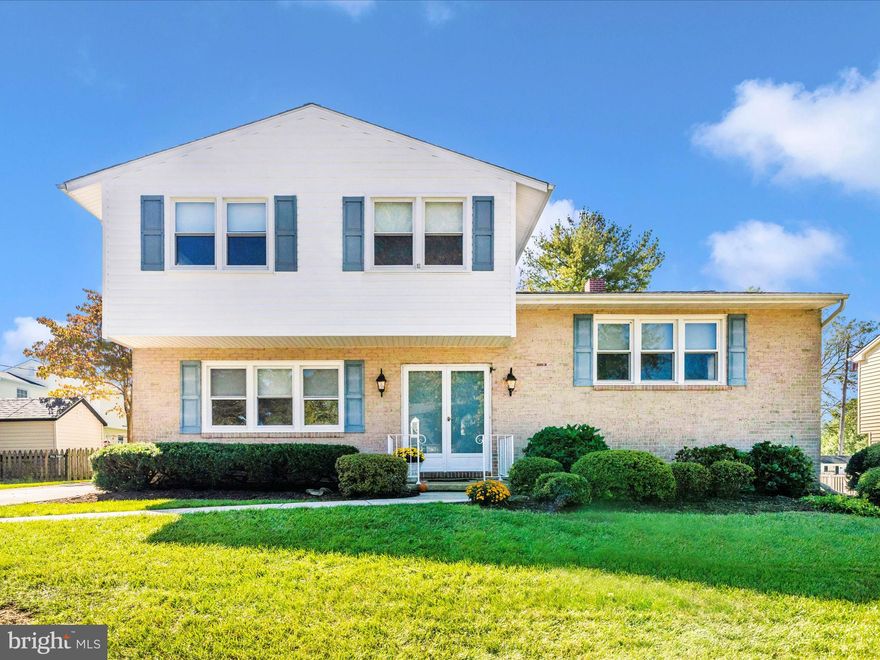 Step into this spacious and thoughtfully designed split-level home featuring 4 generously sized bedrooms and 2 1/2 bathrooms, perfect for growing families or those who love to entertain.  The layout offers a seamless blend of privacy and openness, with distinct living zones that cater to both relaxation and productivity. One of the standout features of this home is its backyard that overlooks open school land--offering a sense of privacy and a tranquil view with no immediate rear neighbors. Inside you will find a spacious living room, dining room and spacious kitchen with stainless appliances.  The main level features a large family room with a full brick wall fireplace, a slider that opens to the covered patio and a powder room.  Also, on the main level the bedroom could be used as an office and provides a bright and functional environment. Located in sought-after Springdale, your just minutes from local parks, shopping, dining and the community pool.