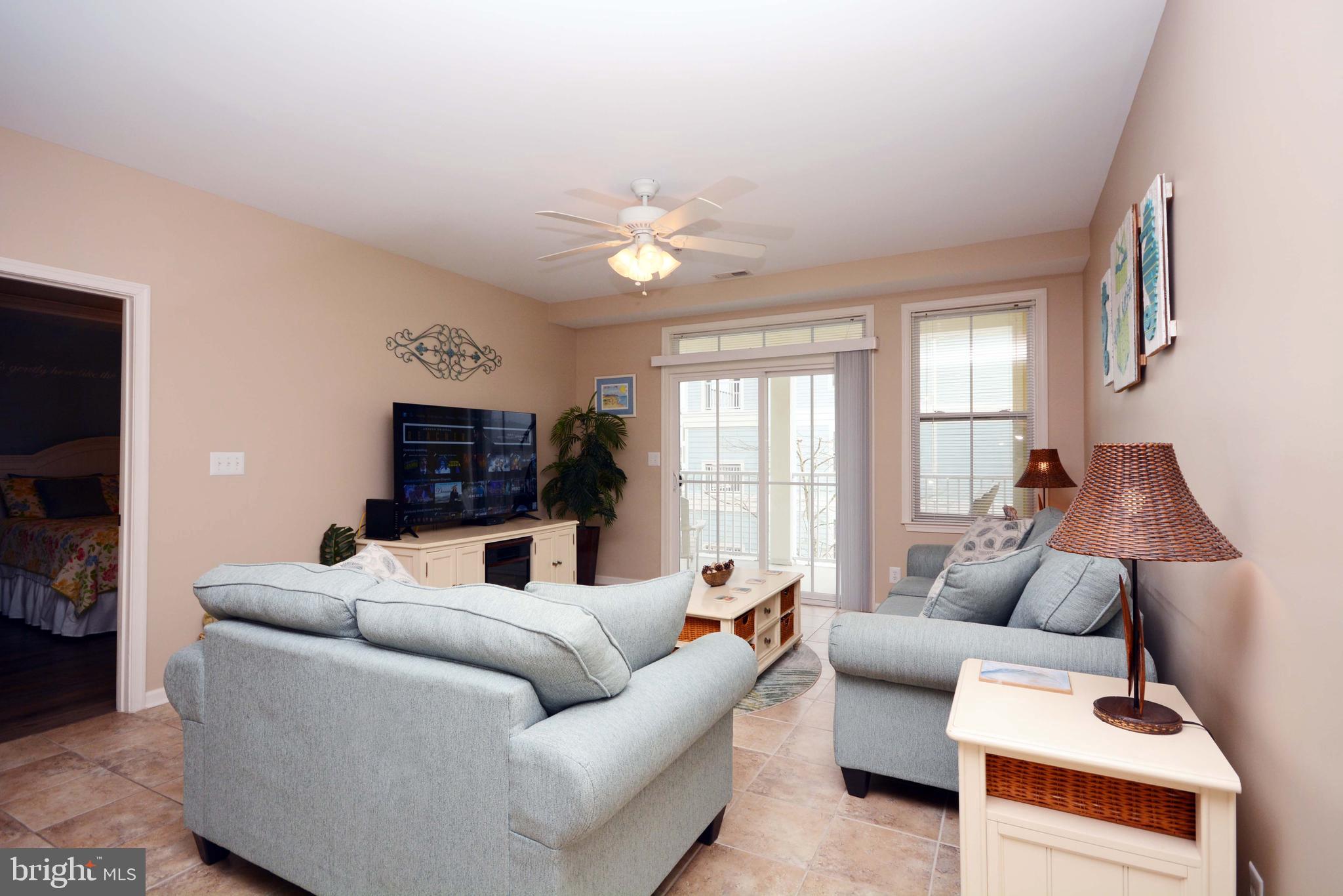 Beautiful and tastefully decorated beach home in the private community of Sunset Island. Sold fully furnished, luxury engineer flooring through all bedrooms and tile in the hallway and living room. Brand new set of sofas.The master suite has a private master bath with a soaking tub, double sink vanity, and stand alone separate shower. Private balcony with lovely fountain views and just walk distance to the club house.Balcony access available from the living room and master suite. Sunset Island amenities include indoor/outdoor pools, fishing pier, private beaches, walking trails, restaurant, clubhouse, 24 hr. security, interactive fountains, and much more. Great investment property, rental potential 30K-40K.