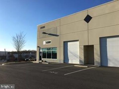 Photo of 23585 Overland Drive #100, STERLING, VA 20166 (MLS # VALO2116074)