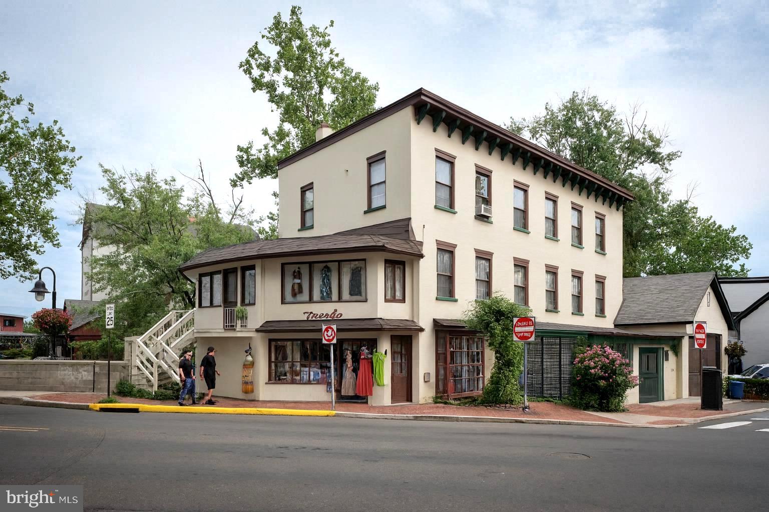 Once-in-a-Generation Offering: Historic Mixed-Use Gem with Waterfall Views in the Heart of New Hope, PA
Welcome to 76 South Main Street — a rare and storied property nestled in the vibrant heart of New Hope, Pennsylvania. Built circa 1900 and spanning over 4,600 square feet, this brick-clad treasure offers a unique blend of historic charm and modern potential. This breathtaking building overlooks one of the town’s most iconic natural landmarks: the cascading waterfall beside the original mill, a view that has enchanted generations and remains central to the town’s romantic charm. Located in one of Bucks County’s most coveted retail corridors, it stands as a beacon of opportunity amid the cultural vibrancy that has earned New Hope its reputation as the “New Hamptons” of the Northeast.
The property offers both immediate income potential and long-term redevelopment upside.This mixed-use building features three retail storefronts with prime visibility along bustling Main Street. Two are currently active, while the third remains easily reclaimable, offering flexible income potential. Above, the second and third floors present an exciting canvas for redevelopment. Whether envisioned as three townhome-style apartments or two luxurious flats, the upper levels promise sweeping views of the Bucks County Playhouse, the original mill, and the cascading waterfalls below that have long defined the town’s romantic allure.
The property’s location is unparalleled — steps from the Lambertville Bridge and surrounded by a year-round buzz from wine bars, riverfront bistros, art galleries, and boutique shops. It’s where the energy of Broadway-caliber performances meet the serenity of the Delaware River, creating a lifestyle destination that draws visitors and local residents year-round.
With its commanding presence, deep historic roots, and unmatched views, 76 South Main Street is more than a property — it’s a legacy waiting to be reimagined. Whether you’re a developer seeking a transformative project, an investor eyeing steady returns, or a visionary entrepreneur inspired by New Hope’s artistic soul, this is a singular opportunity to shape the future of one of Pennsylvania’s most beloved riverside communities.