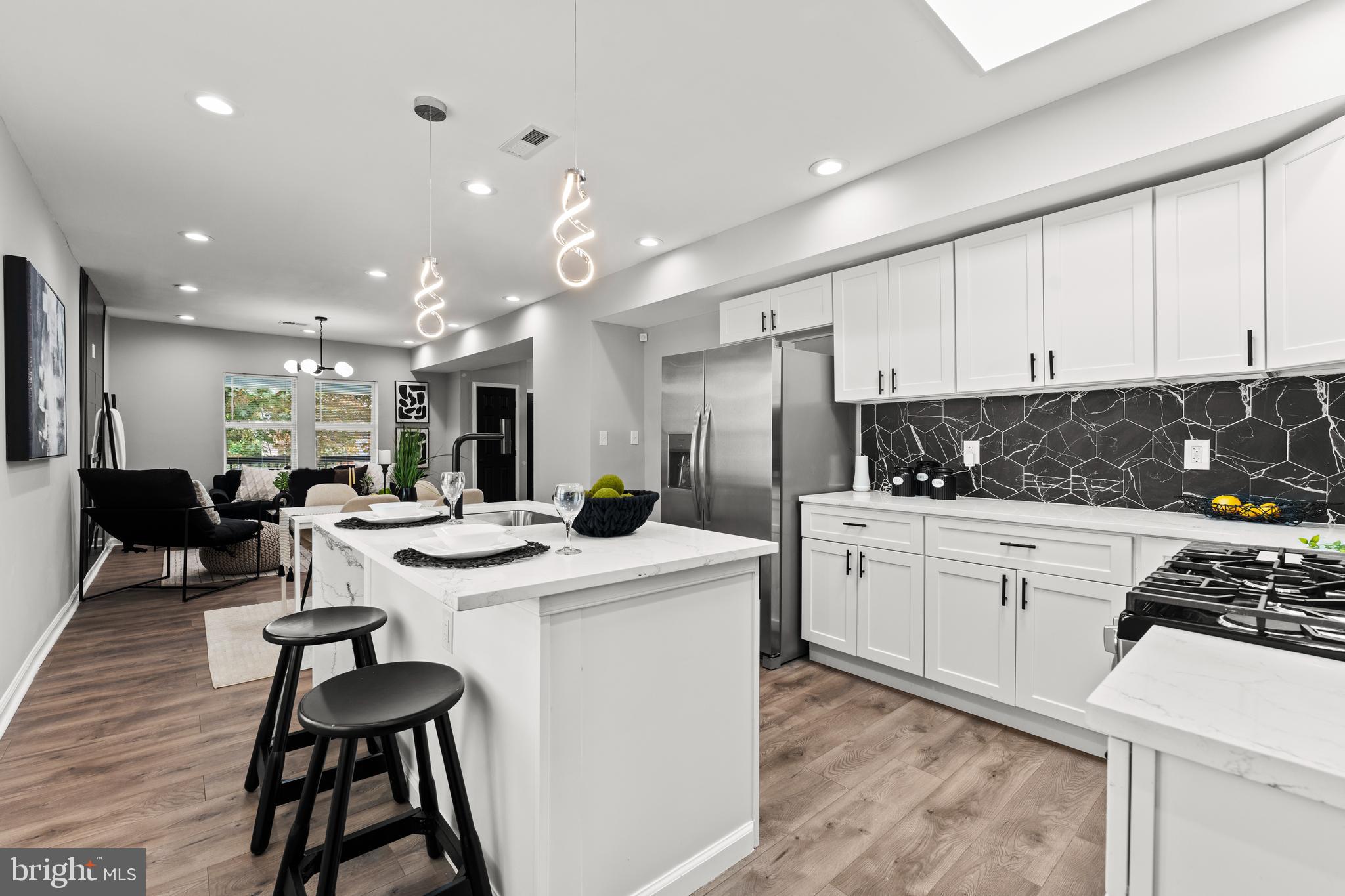 *BUYER FINANCING FELL THROUGH AT THE 11TH HOUR! THEIR LOSS IS YOUR SECOND CHANCE!!*This newly updated 4-bedroom, 2.5-bath single-family home offers the perfect mix of modern upgrades and everyday comfort — ideal for families, professionals, or anyone looking for more space in a well-connected Baltimore neighborhood. Step into a brand-new kitchen featuring a stylish island, stainless steel appliances, and sleek finishes that make cooking and entertaining effortless. The private primary suite includes a full bathroom with a tub and shower combo, providing a relaxing space to unwind.
A finished basement adds flexible space for a media room, home gym, or additional guest area. Out back, you’ll find a huge yard perfect for hosting cookouts or enjoying a quiet evening. Off-street parking in the rear adds everyday convenience. Located near local gems like Forest Park Golf Course, Gwynn Falls Trail, and Druid Hill Park, with easy access to commuter routes like I-70 and I-695. Enjoy shopping and dining in nearby Woodlawn and Catonsville, all just a short drive from downtown Baltimore. Highlights: 4 Bedrooms | 2.5 Bathrooms; New Kitchen w/ Island & Stainless Steel Appliances; Private Primary Suite w/ Tub/Shower Combo; Finished Basement; Large Backyard + Rear Off-Street Parking. Don’t miss your chance to own this move-in ready home with space, style, and a great location. Schedule your tour today!