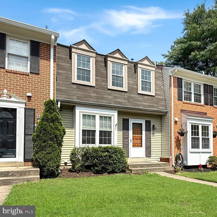 Beautifully maintained 3 bedroom townhouse in the heart of Rockville! This home has beautiful hardwood floors, wonderfully updated kitchen, updated bathrooms, and more. The main level includes the kitchen, dining room, living room, and a half bath. The kitchen includes beautiful granite counters, new flooring and plenty of storage. The living room opens onto a large deck with steps to the recently fenced lower patio, perfect for relaxing in the morning or cookouts in the afternoon.  
The upstairs features 3 bedrooms with a full hall bath and a full en suite bathroom in the spacious primary bedroom.  
The lower level includes another half bath, a large utility room, and an enormous finished space for a home gym, a rec room, or other common space with beautiful newer floors. 
This home is centrally located close to everything Rockville has to offer including shopping, restaurants, public transportation (both bus and metro!), and easy access to commuter routes along the beltway and I-270.