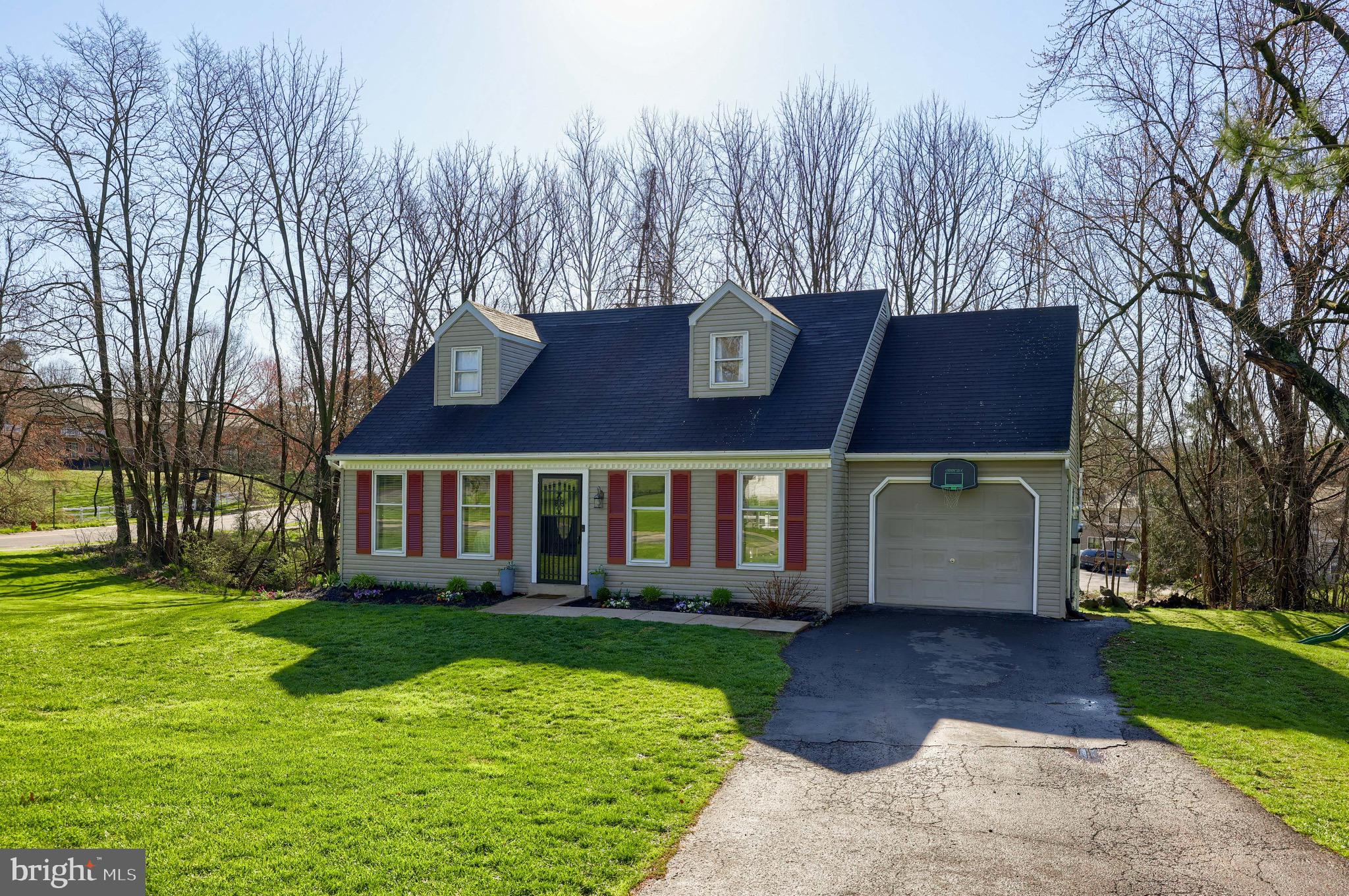 Designed with busy families in mind, this gorgeous four-bedroom home in the heart of Lancaster has been recently upgraded to give the modern family everything they need for a comfortable and functional place to call home. This 1503 square foot home sits on a large grassy lot dotted with mature shade trees and has a private driveway with room for two cars. Red shutters pop against the gray toned exterior, and large windows give the front of the home a welcoming feel. 

Inside, you'll notice how the vinyl plank flooring, soaring ceilings, and large windows create a warm and welcoming space that the whole family can enjoy. The downstairs living room is surrounded by windows and flows effortlessly into the gourmet kitchen. The open-concept floor plan makes it easy to move from one room to the next, and the neutral colors serve as a blank canvas to transform this living room into something uniquely your own. 

The sunny and modern kitchen features a granite center island, custom cabinets, name-brand appliances, and a sleek subway tile backsplash. Edison style lights hang from the ceiling, and open shelves offer additional storage space while giving the kitchen an open and seamless feel. A window over the sink looks out over the backyard and fills the kitchen with natural light in the afternoons. 

Push open the sliding glass doors from the kitchen and step out onto the private balcony. Enjoy coffee out here in the mornings, or set up your favorite outdoor lounge furniture or rocking chairs to create a comfortable outdoor living space with a view. 

This beautiful home has two bedrooms on the main level, one being a spacious master suite with a private bathroom. Downstairs, the basement offers an additional hangout spot. This bright and airy basement can easily be converted into a finished secondary living room, home gym, home office, teen hangout space, or playroom. The basement is divided into a few separate areas, creating a space designated for laundry, another space designated for hanging out, and a third area for storage. 

From the main floor living room, a beautifully hand-crafted staircase leads up to a second level. This floor offers two additional bedrooms and a full bathroom.This home is designed to give families plenty of space to spread out.

The house backs up to a wooded lot and has large front, side, and backyard spaces. The lush backyard is a mostly flat space with plenty of room to grow a garden, set up a playset or trampoline, or invite people over for a backyard barbecue. 

Located in the heart of Lancaster, this home is close to many public and private schools, grocery stores, hospitals, doctors' offices, retail shops, restaurants, parks, and playgrounds. Minutes from local highways and the on-ramp to the interstate, living here means easy access to everywhere you want to be in the Lancaster area. 

If you're looking for a recently renovated home with a lot of room to spread out, you'll quickly fall in love with this four-bedroom home in a quiet and family-friendly neighborhood.