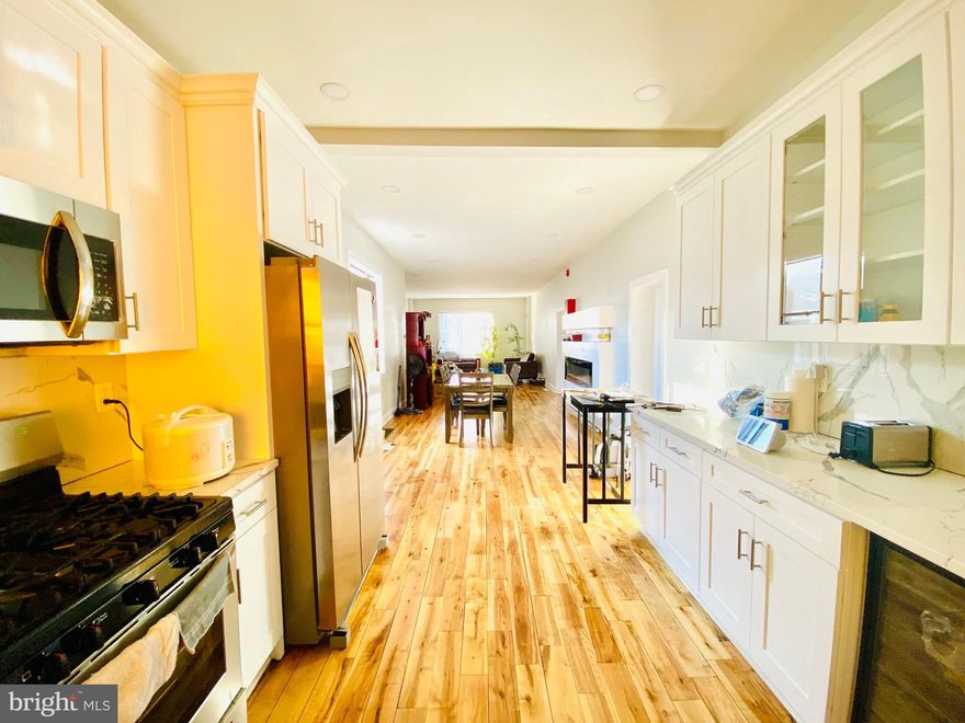 Unlock the potential of this exceptional mixed-use property, offering the perfect blend of business opportunity and residential income. Located in the heart of the highly sought-after Girard Estate neighborhood of South Philadelphia, this 2,992-square-foot two-story versatile property  offers boundless opportunities for entrepreneurs, investors, and visionaries.

Key Features:
Newly Renovated Second-Floor Apartment: A modern 2-bedroom, 2-bath residential unit, perfect for rental income or owner occupancy.
First-Floor Commercial Space: Expansive and versatile, ideal for a daycare, coworking hub, trendy eatery, creative studio, or other entrepreneurial ventures.
Finished Basement: Adds valuable space for storage, operations, or potential additional usage.
Spacious Lot: Situated on a 1,984-square-foot lot, offering room for flexibility and growth.
Prime Location: This property benefits from high visibility, a strong community presence, and convenient access to public transportation, major highways, and Center City Philadelphia. With rising property values and increasing demand for commercial and residential spaces, South Philadelphia presents unparalleled opportunities for long-term growth and success.

This property is more than just real estate—it’s a gateway to financial freedom and community impact.  It’s a transformative opportunity to invest in a sought-after location with future growth potential.

Whether you’re a seasoned investor or a first-time buyer, 2135 S 17th St is your chance to secure a transformative asset in a thriving, sought-after neighborhood.

Schedule a showing today and start building your wealth in this dynamic and thriving community.