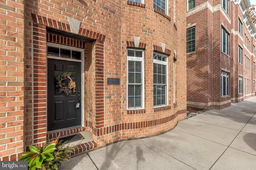 Beautiful 3 bedroom Locust Point townhome with 4-Car Parking (including 2-Car Garage). The living level is spacious with tons of natural light, wood floors, recessed lighting, crown moulding and separate living & dining rooms. The bedroom level has a large master suite w/ a walk-in closet, 2 additional bedrooms and a full bath. The ground level has a office, half bathroom and access to the attached 2-car garage. Inside stairs lead you to the rooftop deck which has amazing city views.