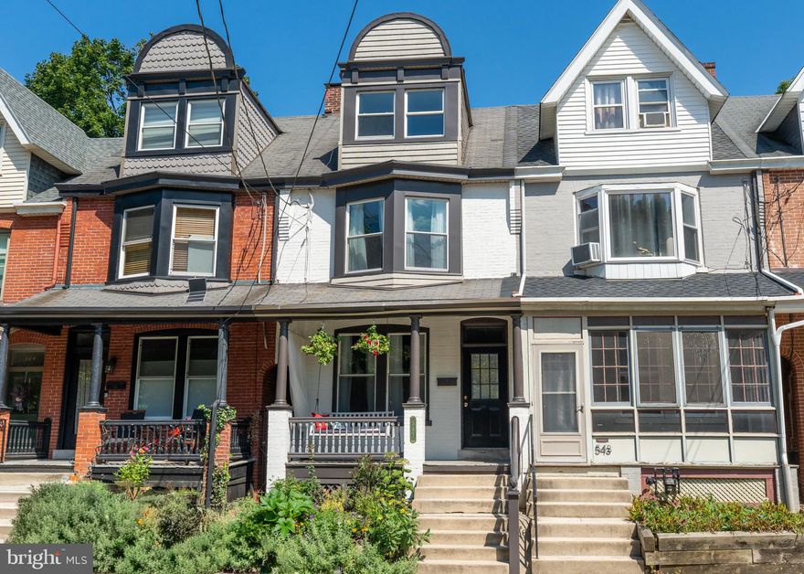 Welcome to your dream home in the heart of Chestnut Hill! Nestled on a quiet one-way street across from the picturesque Lancaster Theological Seminary, this beautifully maintained 4-bedroom, 2-bathroom townhouse seamlessly blends historic charm with modern comfort. From the moment you arrive, the white painted brick exterior and inviting front porch with a classic porch swing set the tone for the warmth and character found throughout. Step inside to discover rich original hardwood floors that flow through spacious, light-filled living spaces. The main level offers a spacious living room centered around a stunning brick gas fireplace, complete with decorative lava rocks and black glass. Just beyond, the formal dining room is flooded with natural light and leads into a gourmet kitchen featuring corian black quartz countertops, stainless steel appliances, ambient lighting, and an ornate tin ceiling. A full bathroom on this level boasts a sleek stainless steel walk-in shower with a heat lamp and a modern vanity with built-in electrical outlets for convenience. Enjoy direct access from the kitchen to a private two-level deck—ideal for summer gatherings. Upstairs, the second level features three bedrooms, each with its own closet with built-in shelving. The rear bedroom opens to a balcony overlooking the fenced backyard, creating the perfect spot to unwind. The spacious primary bedroom includes a large walk-in closet and offers picturesque views of the gothic architecture of Lancaster Theological Seminary. A centrally located full bathroom with a tub-shower combo serves this level. On the third floor, you’ll find a spacious fourth bedroom beautiful natural light and a walk-in closet adorned with vintage wallpaper—an ideal guest room, office, or creative space. The unfinished basement offers laundry facilities and endless potential, with walk-out access via Belco doors to the backyard. A gated locked alleyway provides convenient front-to-back access. Located within walking distance of Franklin & Marshall College, the city’s best restaurants and bars, and the local dog park, this home offers the best of Lancaster living. Don’t miss your chance to own this one-of-a-kind property—schedule your private showing today!