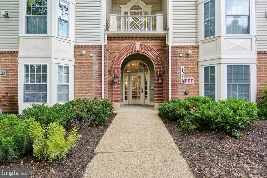 This mid-level condo overlooks wooded open space facing the rear of the building.  Across the street is a beautiful park with a fountain reminiscent of the name of this delightful community. New Luxury Vinyl Plank Flooring and New Carpet. There are ball fields and play areas for children of all ages within this community as well.  This condo has two bedrooms each with a full bathroom and a walk-in closet.  The bedroom suites are on opposite sides of the condo. The living room in the center of the condo opens to a balcony overlooking the woods and the living room has a gas fire place.  There is plenty of room for stools at the kitchen counter which overlooks the living and dining spaces. Both bedrooms and the living room overlook the wooded area out back. Washer and dryer are just inside the condo off the foyer.  Shopping and restaurants nearby and great commuter routes.