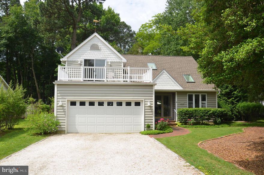 Sophisticated, well-designed contemporary home sited on a very desirable street just outside St. Michaels' town limits (Riverview Terrace). Constructed in 1997 and continuously renovated and updated between 2014 and 2023, the house is in immaculate "turn-key" condition. Recent improvements, since 2021, include new architectural-grade roof shingles; new skylights (5 skylights); oversized gutters w/guards; wood decking replaced with Timbertec composite decking; new crawl space dehumidifier and new HW heater. Featuring soaring ceilings w/skylights, warm solid maple floors and generous windows and glass doors, this is a bright, spacious and welcoming home throughout. Thoughtfully designed kitchen w/gas range and functional breakfast bar. Downstairs primary bedroom with walk-in closet features an exceptional primary bath which was enlarged and updated in 2015. Two bedrooms and a spacious balcony upstairs provides a great place to sit back, relax and enjoy views of the Miles River. Attached 2-car garage w/recent electrical wiring for EV charging.  Spacious deck in back overlooks a quiet, peaceful back yard. Public water and public sewer, but no town taxes! Wonderful street with a public waterfront park on the Miles River just one block away!