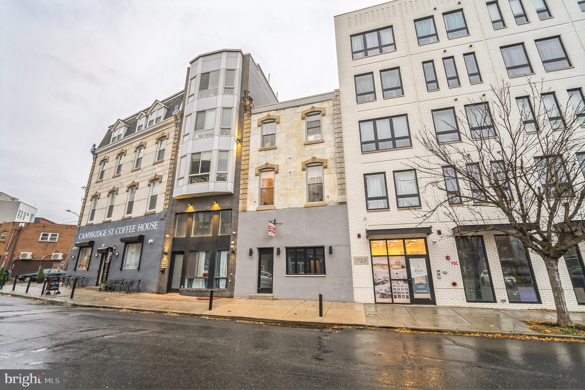 Situated at 1729 Ridge Avenue, this mixed-use building comprises three units, featuring a ground-floor commercial space and two residential units on the floors above. Recently renovated, the apartments boast new flooring, kitchens, bathrooms, and updated systems. Each unit is individually metered, with tenants responsible for utilities.

The commercial space is well-suited for an owner-occupant business. Spanning from Ridge Avenue to Cambridge Street, the property offers exclusive rear access to the residential units. Nestled in a Qualified Opportunity Zone (QOZ), the centrally located property is positioned between Fairmount, Girard College, and Temple University.