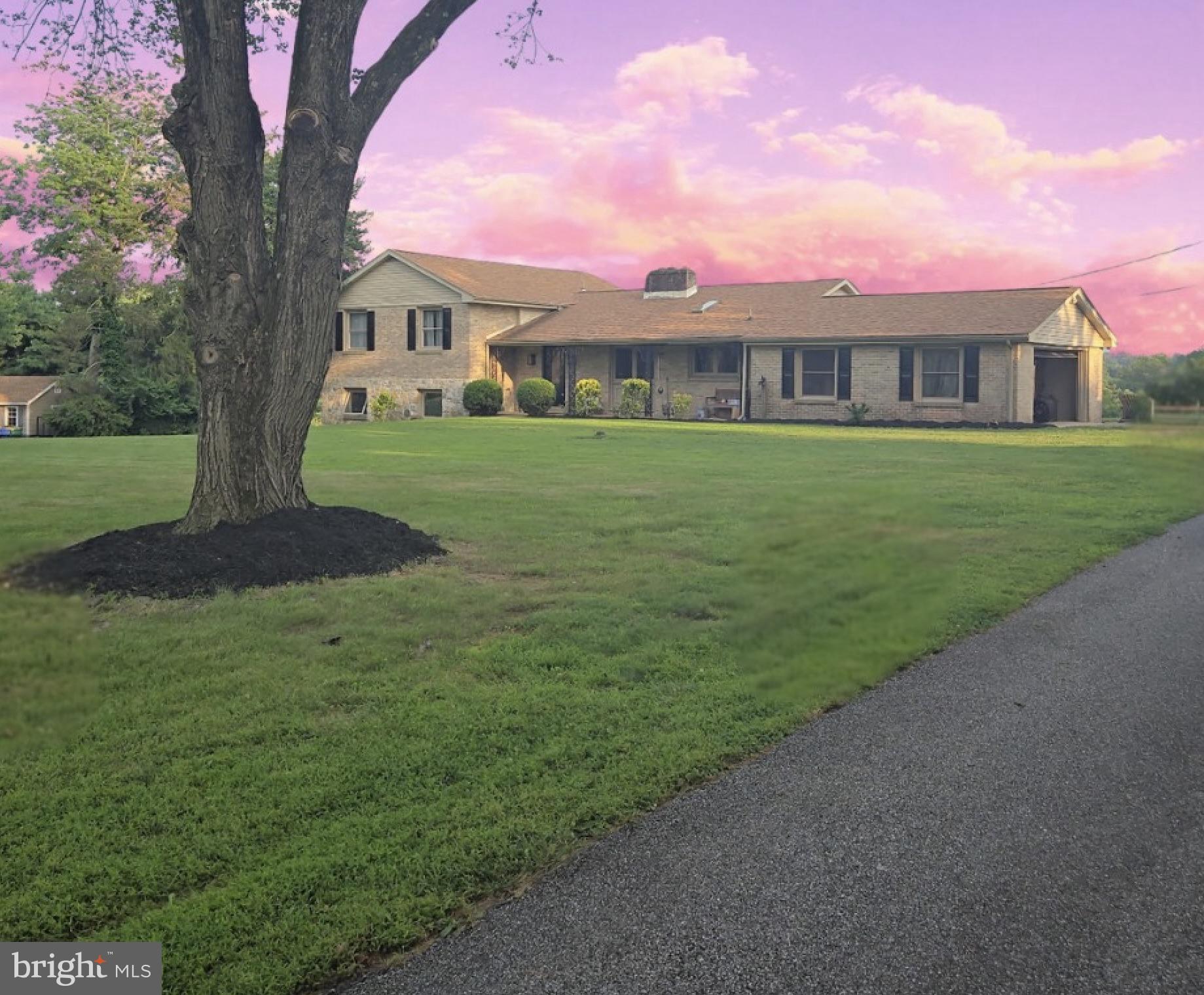O P E N H O U S E *Sat 8/23 & Sun 8/24* 11a-4p.
Simply BREATHTAKING views from a lovely 1.6 acre lot with an in-ground pool! This treasure sits on a cul-de-sac with lots of space between homes, but still offers a neighborhood feel! This home provides comfort, beauty, and privacy. The brick and stone split level/colonial home has been proudly cared for by ONLY two families. You can be the third to experience home on this incredibly magnificent piece of real estate in the award winning school district of Garnet Valley!
Built of all plastered walls and masonry, each brick and stone was carefully selected by the original owner. The home boasts 3 fireplaces; one in the kitchen that can double as a brick oven for the family's pizza night, another in the living room, & the third is in the family room of lower level. The entire layout is well-designed and convenient for all. Spend time on your front porch relaxing as you sip your coffee or tea. Enter the home and you're greeted by a large eat-in-kitchen area with a fireplace and new luxury vinyl flooring throughout. The living room boasts a large window which serves as a gorgeous back drop of the pool and view! The formal dining room has a separate entrance that leads to the back patio, where BBQing and roasting marshmallows are just the beginning of the possibilities of fun and night swimming!
A new garage door motor (2025) has been installed and the attached 2 car garage has a convenient entrance into the home’s kitchen.
For game day or movie night, venture to the large lower level family room with recessed lighting and a fireplace. Tons of natural light through the large windows! The lower level also has a full bathroom, a formal laundry room, and the 4th bedroom that offers cedar closet and double doors that lead to the side yard! The lower-level family room and bedroom were updated in 2025. This lower level also provides an opportunity for an in-laws or au pair / nanny suite. The basement (840 sq ft) has plenty of room for storage and utilities.
The upper level offers three bedrooms, a primary ensuite bathroom, and a hall bathroom (updated 2025). The large primary bedroom and ensuite bathroom were painted and updated in 2025. The 2nd and 3rd bedrooms finish the upper level of this home.
Original hardwood floors cover the upper level, luxury plank vinyl cover the main and lower levels (2025). Freshly painted throughout (2025). New shingle roof (2021). HVAC serviced routinely. Chimney cleaned routinely.