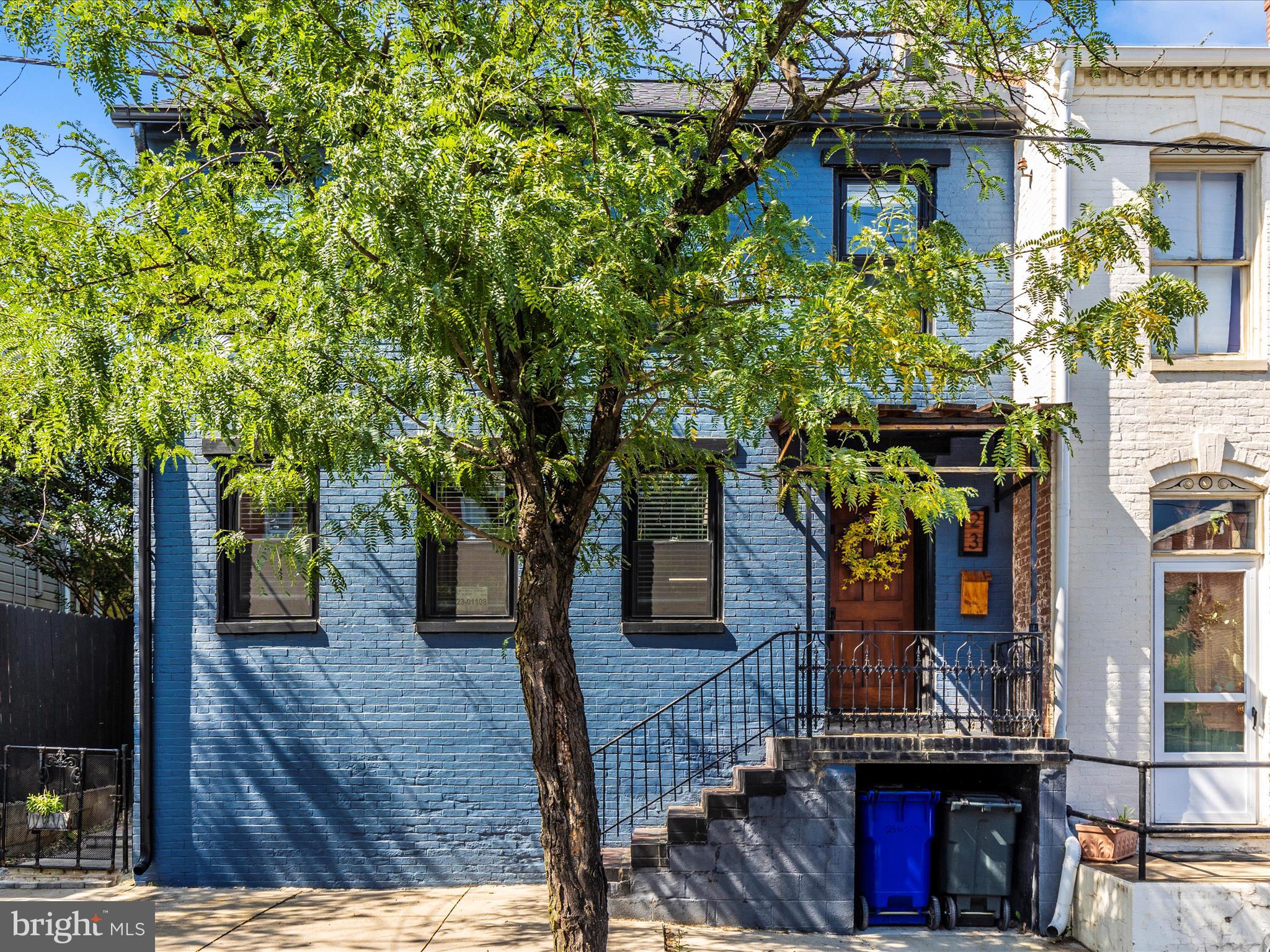 Welcome to 23 W. 5th Street, where historic charm meets modern living in the heart of downtown Frederick. This beautifully updated home features an open-concept layout with a wider floor plan than most downtown properties, offering a spacious and inviting feel throughout.
Enjoy custom finishes, granite countertops, and an oversized luxury bathroom that truly sets this home apart. The first floor sits above street level for added privacy and natural light.
Outside, relax or entertain in the thoughtfully designed backyard, complete with a brick patio, outdoor grill, greenhouse, and raised “no-bend” garden beds. A rare find in the city, the property also includes private off-street parking for up to 3 vehicles.
Additional upgrades include a 200-amp service panel and a detached design on one side, giving you more light and air than typical row homes.
Best of all, there’s still time to add some of your own personal touches and custom finishes to make it truly yours.
Just blocks from all that downtown Frederick has to offer, shopping, dining, and parks. This one is not to be missed!