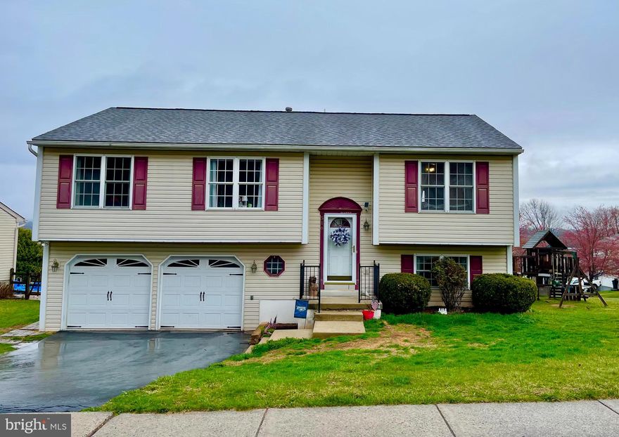 OFFERS RECEIVED.  SELLER IS REQUESTING THAT ALL OFFERS BE SUBMITTED BY SATURDAY, 4/5 @ 8:00 PM.  Guaranteed you will fall in LOVE with this 4 Bedroom, 2 Full Bath Bi-Level home in the popular Creekside Subdivision in Daniel Boone Area School District! The OPEN FLOOR PLAN with combination living, dining & kitchen is easy entertaining!  The kitchen has an oversized 2-tier island/breakfast bar with additional cabinetry, Corian kitchen countertops, tile backsplash and stainless appliances.  The dining area has a sliding glass door that leads you to the rear balcony Trex deck and also Trex steps leading to the rear yard with storage shed and separate patio! All bedrooms are nicely sized with ample closet space.  The "Jack & Jill" full main bathroom has a door from the main bedroom as well as a door from the hallway. The lower level houses a spacious rec room, a full bath with stand-up shower and another bedroom or bonus room/office area with closet.  Also, the lower level houses the laundry room, sliders to the rear patio and entry into the 2-car attached garage which contains storage shelving, workbench and utility sink. Home has central air, GAS heat/hot water/cooking.  The owners have lovingly maintained this home with updates including a new roof in 2021, newer ceiling fans & lighting fixtures throughout, hot water heater in 2016, newer bedroom carpet in the 3 bedrooms and new lower-level laminate plank flooring in 2024!  And, there is a little garden area in the rear yard if you like growing your own fruits & vegetables--4 blueberry bushes have already been planted for you!  The location of this home is perfect since you are located extremely close to major routes, grocery stores, banks and restaurants! Schedule your showing TODAY!