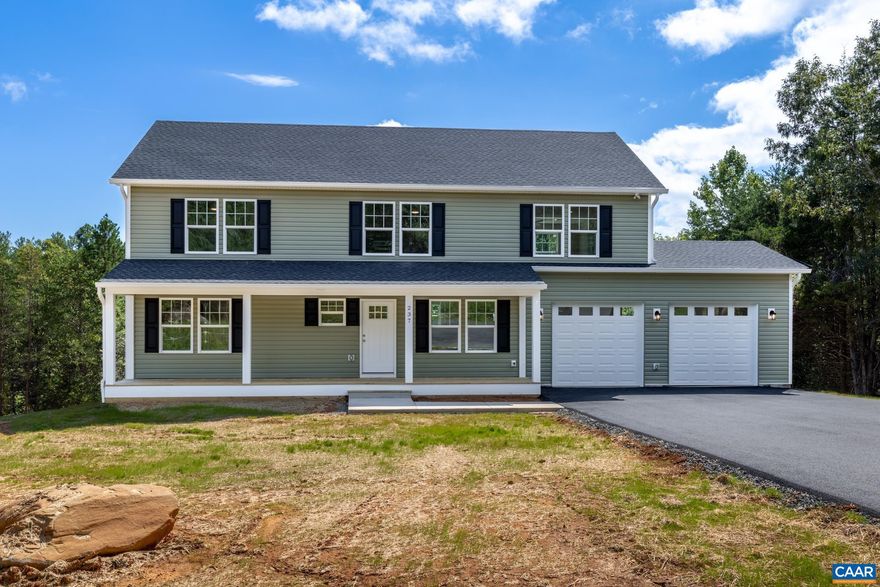 Welcome to this stunning, newly constructed Colonial home. Located on a private 2.06 acre cul-de-sac lot in Hancock Farms, this home backs up to a large common area that adds to the coveted privacy. This beautiful 4 bedroom, 2.5 bathroom residence offers spacious living. The gourmet kitchen boasts granite countertops, an island, white wood cabinets, and stainless steel appliances. Enjoy a large family room (28.8x16.1) and a luxurious primary suite (15x23.3) featuring dual vanities and a sitting area. The full basement is unfinished but includes rough plumbing for a future bath and another laundry room, along with all studs being painted white. Outside, a deck, covered front porch, enhance the solitude of the wooded setting.,Granite Counter,White Cabinets,Wood Cabinets