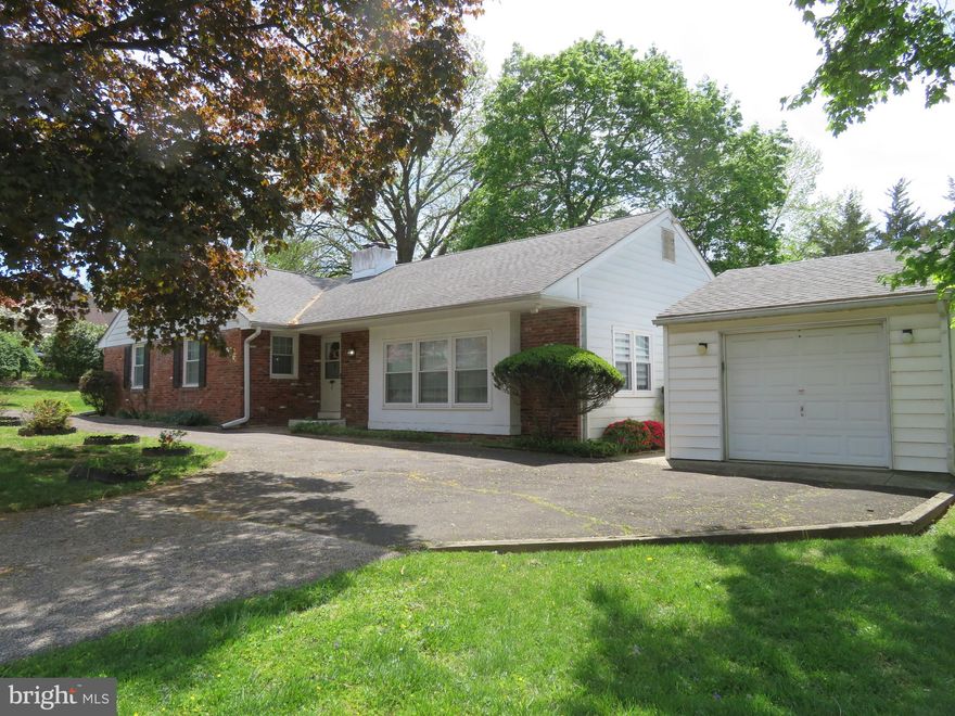 Welcome to this lovingly maintained 3-bedroom, 2-bathroom detached Brick Ranch — a perfect opportunity to make a home truly your own! Step into the welcoming wood-floored entry foyer that opens into a spacious living room filled with natural light from large windows and deep sills. The open layout flows seamlessly into the dining room, perfect for entertaining.  The kitchen features wood cabinetry, gas cooking, updated LTV flooring, a convenient laundry closet, and direct access to the rear yard and garage area. Just off the kitchen, step up into a cozy family room with a charming brick wood-burning fireplace, a generous closet, and sliding doors leading to an enclosed sunroom and a beautiful backyard—ideal for year-round enjoyment.  The primary bedroom offers a large closet and a private ceramic tile bath with a shower stall. Two additional bedrooms, including one with dual closets, share a full ceramic tile hall bathroom with a tub/shower combo.  The full basement is a true bonus, featuring two large finished areas—perfect for a game room, home gym, or media space—and a massive unfinished area with endless possibilities for storage or future expansion.  Recent updates include new windows, a new roof, and a newer HVAC system. Location is everything! Just steps from playgrounds and ball fields, and offering easy access to the train station, grocery stores, restaurants, gyms, and so much more. You’ll love the convenience and community feel this wonderful neighborhood provides.  With solid bones and thoughtful care over the years, this home is ready for your personal touch to make it shine!
