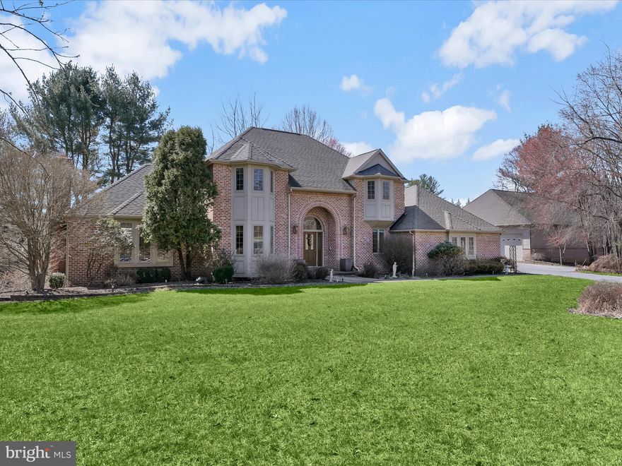 Introducing an exquisite residence boasting four bedrooms with four-full and one-half bathrooms across three levels of thoughtfully designed living space. Nestled on a 3.39-acre lot at the end of a quiet cul-de-sac, this property offers both privacy and convenience, complemented by a versatile detached garage. A grand two-story foyer welcomes guests with timeless accent trim moldings, including chair railing, crown molding, and wainscoting. Elegant and inviting, the formal dining room provides an ideal setting for hosting, with French doors leading seamlessly into the family room and kitchen for effortless entertaining. Unwind in the spacious family room, where a propane gas fireplace with a brick surround adds warmth and character, while glass doors open to a deck overlooking the serene backyard and wooded landscape. Designed for both function and style, the kitchen features granite countertops, a center island, a pantry, and a breakfast nook perfect for casual meals. An electric cooktop, dual ovens, and a warming drawer ensure every culinary creation is a breeze. Adjacent to the kitchen, a well-appointed office space with elegant molding offers versatility to suit any need. Down the hall, a full bathroom with a walk-in shower, a laundry room, and access to the attached three-car garage enhance everyday convenience. Behind French doors, a second office provides additional flexibility, easily serving as a main-level bedroom if desired. Ascending to the upper level, the luxurious primary suite awaits, featuring a tray ceiling, a spacious walk-in closet, and an opulent ensuite bathroom with a walk-in shower, soaking tub, dual granite vanity,  a towel warmer and skylight. Three additional bedrooms share a full bathroom with a tub-shower. A generous storage room completes this level, offering ample space for organization. Downstairs, the finished lower level is made for both relaxation and entertainment, highlighted by a recreation room with a gas stove, a den, and a wet bar with granite counters. Walkout access leads to the outdoor kitchen and patio, seamlessly blending indoor and outdoor living. A large utility room provides additional storage solutions. Outdoor living is equally impressive, featuring a pond with a waterfall, a fenced garden, and an expansive backyard perfect for enjoying nature. Premium amenities include ceiling speakers throughout the home, a central vacuum system, a laundry chute, a water filtration system, and three-zoned heating and cooling and more. Expanding the possibilities, the detached garage accommodates at least three vehicles and offers a wealth of additional features, including a half bathroom, wet bar, laundry, ceiling speakers, a dedicated central vacuum system, and two air conditioning units. The upper level presents a spacious storage area alongside a flexible bonus room, ready to suit a variety of needs.