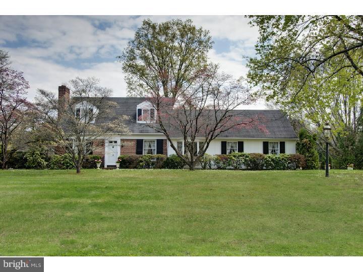 Neutral, bright and beautiful center hall colonial cape with a wonderful and versatile floor plan. The first floor center hall opens to a bright and spacious living room on the left that includes a classic fireplace, large windows and a windowed door to a side patio built with footings to support a future structure.  To the right of the foyer is the formal dining room and eat-in kitchen that is open to a light filled front to back family room.  At the end of the hallway are 2 private bedrooms and a full bath.  The exceptionally well designed second floor offers two large symmetrical front to back (the house is 34 feet in depth) light filled bedrooms; both with private baths multiple windows and closets, as well as a massive bonus space with access through one of the bedrooms.  A large light filled 2 car garage with two 9 foot wide doors has a bonus space plumbed (along the family room wall that could convert to a powder room or laundry) for your convenience.  The bright basement is almost square, and has 6 windows!  This house was custom designed and custom built with many fine features throughout such as 3/4 inch tongue and groove hardwood floors in many areas, solid wood six panel doors, 4 cedar closets, quality trim, millwork and cabinetry, true divided lite wood windows, solid wood raised panel working shutters, a double width brick driveway, gorgeous brick chimney, brick walks and brick rear patio.  An original Philadelphia gas lamp, (converted to electric) a horse's head hitching post mailbox, as well as two classic hanging lantern light fixtures on the garage (side and back) give this home a most distinctive quality. Even the 8' x 10' storage building is out of a storybook!  This very special home is perfectly positioned on a sun-filled lot that has a large flat back yard, complete with many beautiful trees and flowering shrubs.  Super convenient location, minutes to Rt.95, Council Rock Schools, and walking distance to the canal and towpath; yet tucked away from the flood plain and Taylorsville Road!
