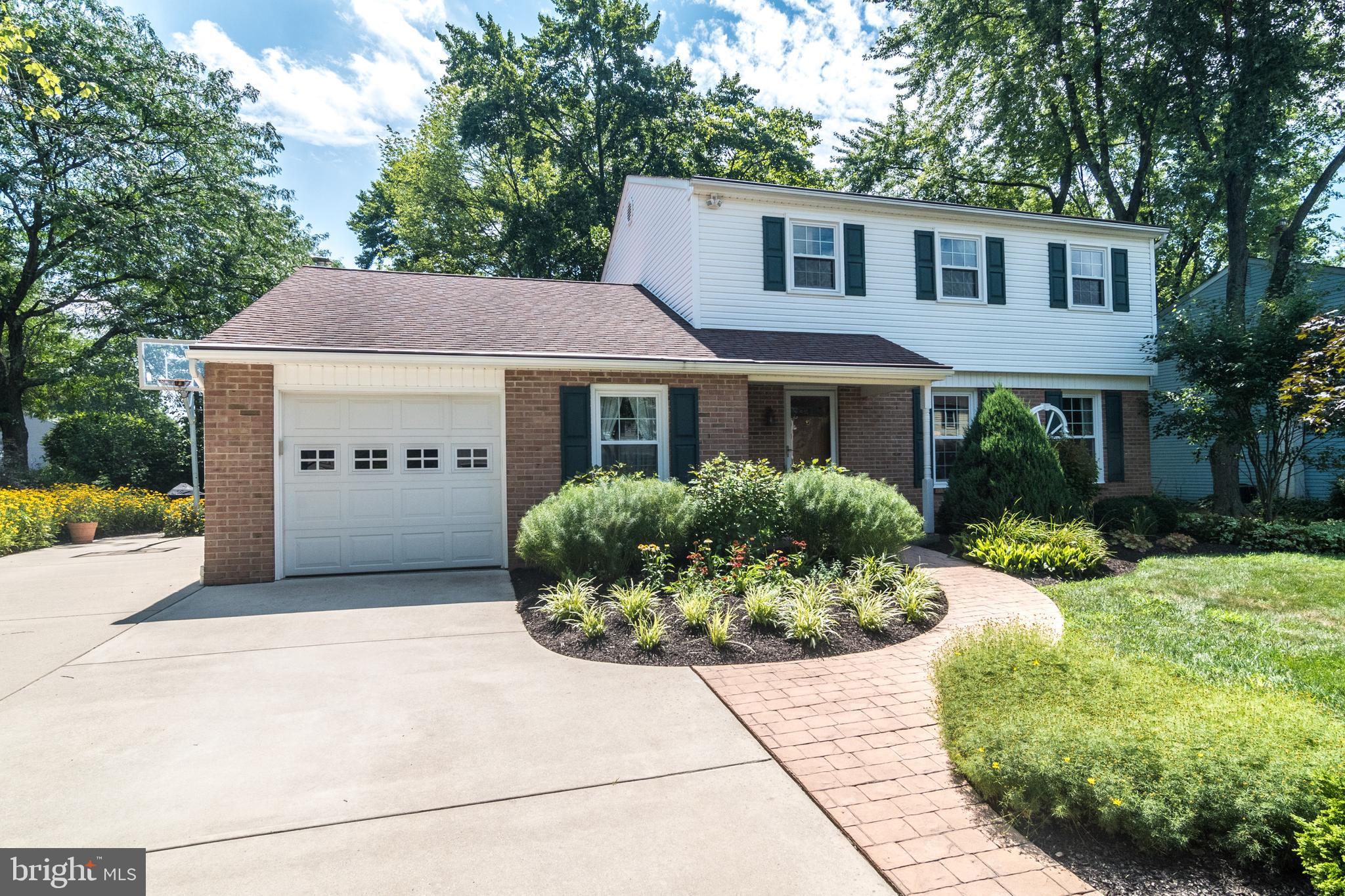 Don't miss the opportunity to purchase this beautiful and charming Warrington Village home! The homeowners have updated and maintained this home to impeccable standards. Get ready to move into this four bedroom, two and a half bath single-family home located in the highly desirable Central Bucks school district! One of the spectacular features is the park- like back yard with an enormous entertaining space consisting of a 20 X21 deck with hot tub included, and 17 X19 paver patio. Professionally installed landscape design and maintenance makes this outdoor space private and breathtaking with a white picket fence and arbor. Backyard storage shed is included. The updated kitchen features cherry cabinets, granite countertops, and Kitchen Aid appliances. There is a peninsula for seating and work space. Room for a kitchen dining table and access to the deck through a newer sliding glass door with blinds built in the glass door. Off the kitchen is the formal dining room and family room to either side. Step down into to a spacious family room where you will find an entertainment bar and wood burning insert fire place. There are so many places to relax and entertain in this welcoming home, including the great room off the main entrance. Laundry room and updated powder bathroom with high end finishes are located on the first floor are easily accessible. Upstairs you will find the large main bedroom with two closets, and a beautifully updated ensuite bathroom. Three generously sized additional bedrooms and a renovated hall bathroom complete the second floor. The home improvements are too many to fully note here. Just to mention a few: New HVAC System (2013), Traine Central Air Conditioning Unit (2013), New Water Heater (2018), plus many more cosmetic improvements throughout. Located in the neighborhood is the Warrington Swim Club, tennis courts, basketball courts and playground. DON'T WAIT, BOOK YOUR SHOWING TODAY!