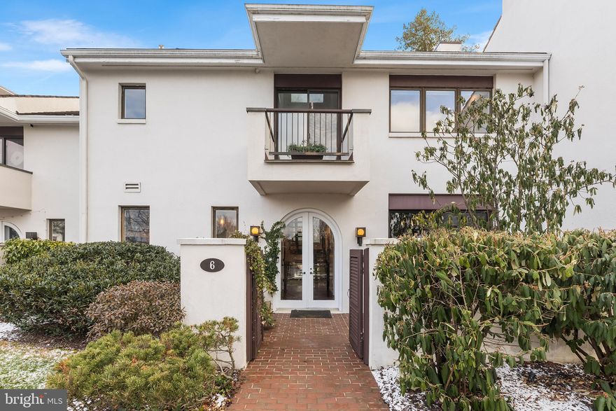 Welcome to this beautifully renovated two-story townhome in the sought-after Arbordeau community, renowned for its distinctive French village charm and peaceful, tree-lined setting. This home is truly one-of-a-kind, a seamless blend of sleek modern finishes and high-end functional design at every turn.  From the moment you arrive, you’ll be drawn in by its architectural style. The enclosed front courtyard, private rear flagstone patio, and two second-floor balconies offer inviting outdoor spaces perfect for morning coffee, al fresco dining, or relaxing at sunset.  Inside, the transformation is stunning. Enter through a custom arched glass front door into a spacious foyer featuring a coat closet and powder room. The open-concept great room boasts a classic all-brick hearth and wood-burning fireplace, plus front-to-back sliding glass doors that lead to the courtyard and patio. The dining room showcases a striking brick accent wall and opens to the patio, creating a seamless indoor-outdoor flow. The gourmet kitchen impresses with sleek, clean lines, updated appliances, modern cooktop, and thoughtfully designed workspace. A laundry closet with a newer stackable washer and dryer is conveniently tucked away. Upstairs, the floating staircase leads to three spacious bedrooms, all with hardwood flooring. The primary suite features a private balcony and a beautifully renovated en-suite bath. Two additional bedrooms share a stunning newer hall bath, combining function and style. The lower level is a bonus with direct garage access, a large second foyer area, family room, private office retreat, workshop, and ample storage/utility space. This exceptional home offers the perfect balance of character, comfort, and modern luxury, all located within the award-winning Tredyffrin/Easttown School District and the prestigious Devon 19333 zip code. Don’t miss your chance to call this one-of-a-kind townhome your own. Schedule your private showing today!