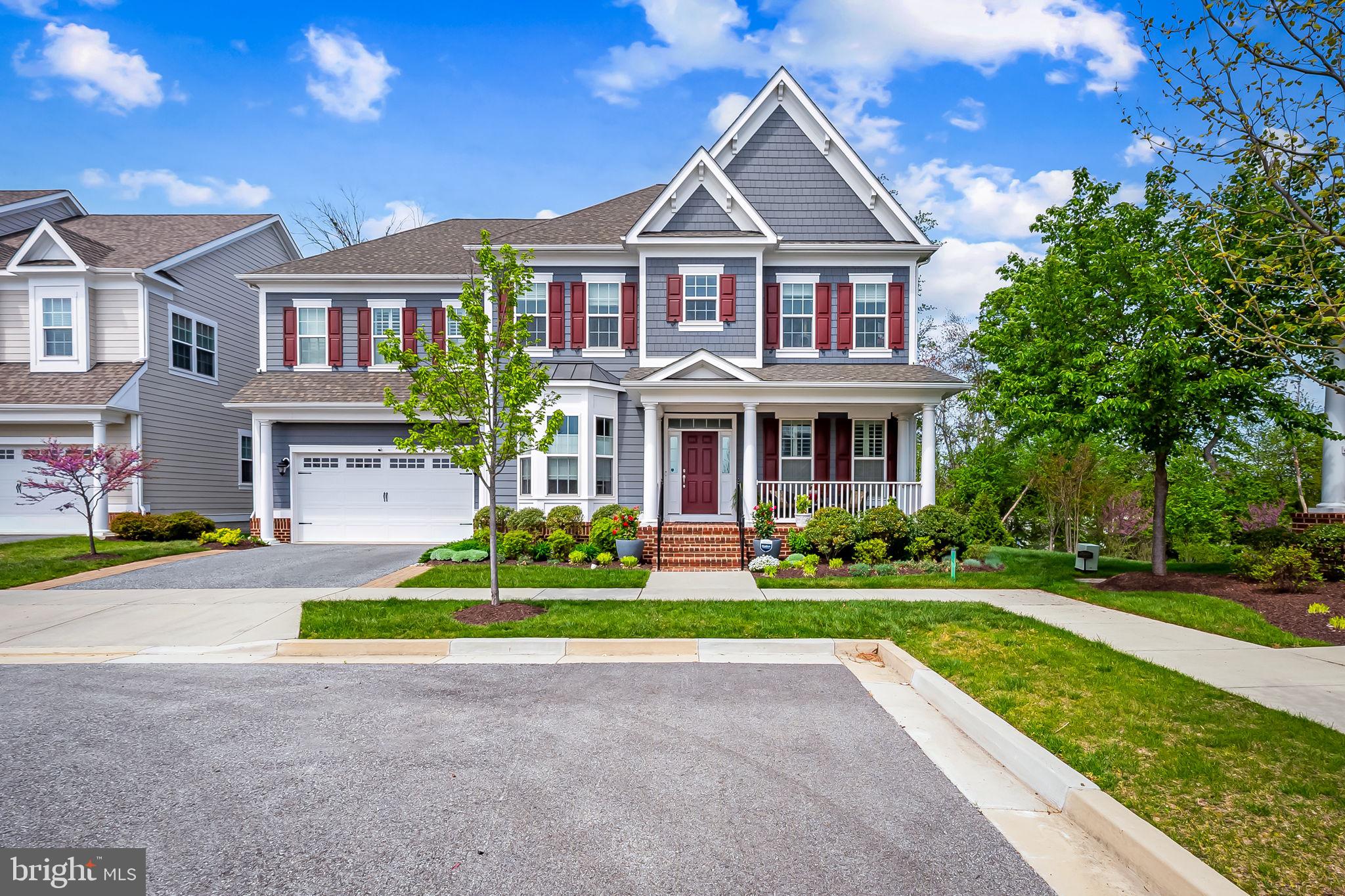 Have you been searching for a home and community that offer elevated living, convenience and sophistication? Look no further! Welcome to 6354 Islington Street – a stunning and custom built 5-bedroom, 5-bathroom residence nestled in a serene corner of the sought-after Greenleigh at Crossroads community. Just 5 years young, this exquisite Williamsburg Homes build offers the perfect blend of modern luxury and thoughtful design, situated on the largest lot in the neighborhood - over a quarter acre! There are no other lots available like this in the entire community.
Step inside to discover the spacious, sun-filled interior and a layout designed for both comfort and entertaining. The main level boasts an attached two-car garage, two generous bump-outs, a spacious first-floor bedroom and full bath —ideal for guests or multigenerational living—formal dining room, dedicated office with built-ins, butlers pantry, large walk-in pantry off mudroom and a sun-drenched eat-in kitchen/sunroom that opens up the heart of the home for relaxed living and effortless entertaining. The upper level offers 3 full baths and 4 bedrooms multiple walk-in closets all offering custom closet systems. The upper level is rounded out with an oversized laundry room and impressive views overlooking the two story great room. Don't forget to check out the expansive lower level with fully finished living and gaming area, full bath with the option for a 6th bedroom with egress window, workout area and endless storage.
Follow the sunshine to the beautifully crafted and thoughtfully designed custom patio with an impressive built in woodburning fireplace– ideal for relaxing evenings and gatherings under the stars. Your guests will appreciate the upgraded lighting, outdoor dining area and activities space thoughtfully designed for all your entertaining needs. The outdoor entertaining area and sprawling, private side yard are accessible via the main and lower levels.
Enjoy the quiet charm of this prime corner location, directly across from a tranquil pocket park and just two blocks from the vibrant community center. Greenleigh offers resort-style living with unmatched amenities, including a state-of-the-art fitness center, scenic walking and biking trails, a dog park, clubhouse, event lawn, sparkling pools, resident lawn care and so much more.
Don’t miss this rare opportunity to own this exceptional and meticulously maintained home in Baltimore County's most desirable community – where every detail is designed for effortless living and lasting memories. It's not just a community, it's a new way of living!