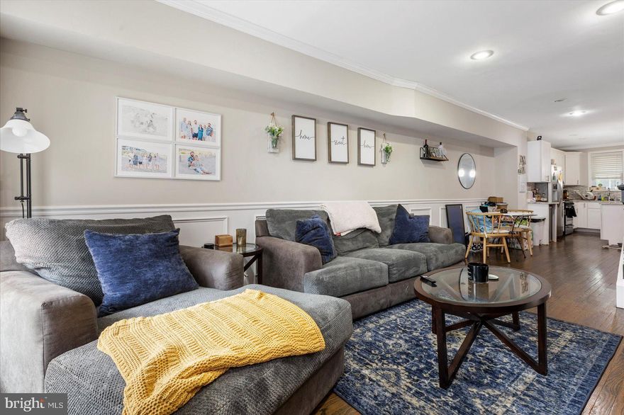 Beautiful rowhome that offers crown molding, box wainscoting, and gorgeous hardwood floors that flow throughout the home. The kitchen boasts 42 soft close  shaker cabinetry, center island with breakfast bar, backsplash, beverage cooler, stainless steel appliances, and granite counters. An exposed brick wall segways into the sundrenched master bedroom. A double jetted soaking tub can be found in the master bath and the second bedroom has access to the private spacious, two-tiered rooftop deck. Ideal for an office or possible bedroom, the lower level family room provides an abundance of possibilities for entertaining family and friends. Close proximity to Patterson Park, Downtown Canton, and the Inner Harbor. Major commuter routes include I-695, I-83, and I-95.