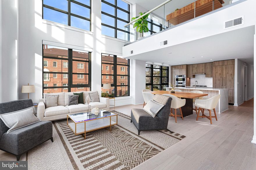 New Construction at the award winning Muse Condominium.  Extremely unique 2 level loft living boasting 14 foot ceilings and ready for immediate delivery! Unit #216 is an open living loft layout with almost 1800 sq ft of light filled space.  2 garage parking spaces included in the price!
 Built by renowned local developer, Carr Companies, the finishes in this building are extraordinary! Clean lines and light textures unite the welcoming chef’s kitchens equipped with paneled appliances, Quartz countertops, a vast kitchen island, including an incorporated wine fridge, and ample storage with custom Italian flat panel wood cabinetry from Snaidero! All homes feature lavish 7.5-inch-wide hardwood flooring, recessed lighting, and window treatments with motorized shades in all of the primary bedrooms. Luxuriate in serenity in owner’s suite/guest bathrooms that include a neutral color palette, Waterworks fixtures, Calacatta porcelain tile, and custom Italian cabinetry. MUSE offers a turn-key elevated lifestyle. Enter into our Grand Lobby, where you will be met by our daytime porter, Full-Service 24-hour Concierge, and on-site building manager. Our engineer will assist with in-home preventative maintenance and our staff is here to assist with your every need. Designed to elevate the most discerning lifestyle, the rooftop clubroom offers endless entertainment options, with large screen TVs, fireplace and gorgeous catering kitchen. Enjoy these perks while enjoying the expansive views of the DC Monuments, Potomac River, and Old Town Skyline. Whether warming by the fireplace, refreshing at the bar in our indoor Watercolor Lounge, or sojourning in solitude, this bright space transitions seamlessly into the outdoors with floor-to-ceiling windows that open up to ample roof top terrace. Bask in the waterfront breeze while firing up the grill or relax in chic lounge seating while enjoying panoramic views. Energy abounds in the Penthouse-level fitness and yoga studios featuring state-of-the-art equipment and cutting-edge technology. Complete with an outdoor fitness terrace, there’s no shortage of options to relieve your stress and stay in shape. MUSE is the ideal location in Old Town's most desirable neighborhood, right in the center of entertainment, restaurants, and shopping, with direct access to the Mount Vernon Trail and a stone’s throw from DC. Come see what all the fuss is about! Muse has a myriad of floor plans to suit your lifestyle ranging from a 1 bed with den to 2 bedrooms.  **Limited-Time Closing Costs Incentive**