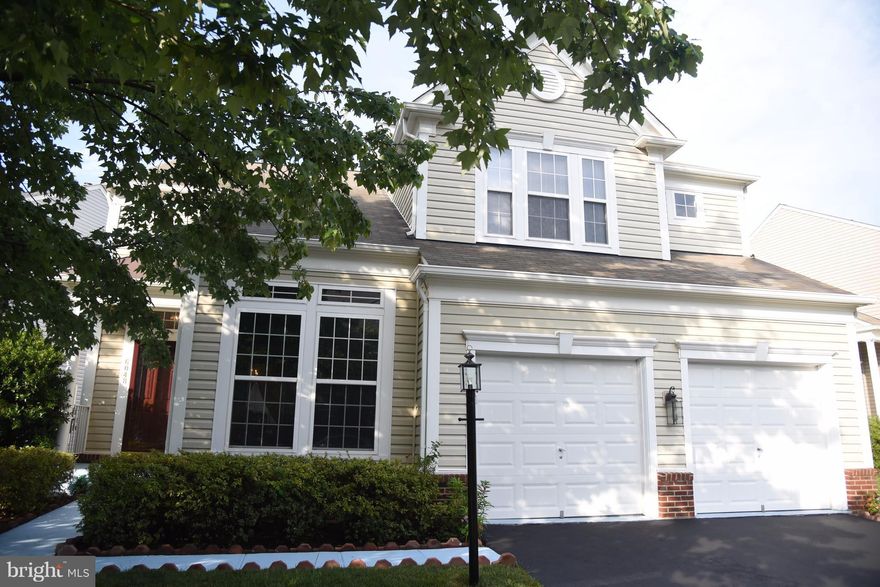 Well maintained, Stunning 4 BR/3.5 bath Colonial Backing to Woods with Huge deck & Nature PREMIUM LOT & LOCATION,  recent improvements include HARDWOOD floor,NEW CARPET & PAINT through out the Home . Expansive Master bed room with Sitting Area. Bright WALK-OUT lower level includes Rec room, Play / Exercise area, Media Room, full Bath.