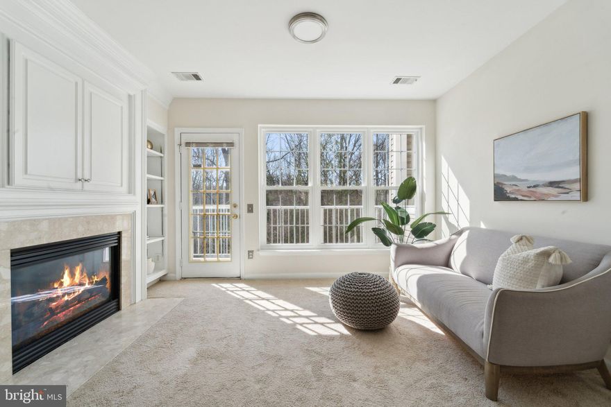 This stunning 2-bed, 2.5-bath townhome-style, two-story condo has been beautifully updated throughout and features its own private ground-level entry. 

The open-concept floor plan offers versatility, with dedicated formal living and dining spaces, plus a beautiful sunlit family room right off the kitchen. This inviting space boasts custom built-ins, a fireplace, and direct access to your deck—perfect for relaxation or entertaining.

The open kitchen is designed for both style and functionality, featuring a breakfast bar, granite countertops, white cabinetry, subway tile backsplash, pantry storage, and stainless steel appliances.

Upstairs, the primary bedroom has been completely remodeled offering an en-suite retreat with a soaking tub, separate stand-alone shower, and double vanity. Oversized windows flood the room with natural light, and the walk-in closet provides ample storage. The spacious guest bedroom includes its own private en-suite bathroom and generous storage.

Community amenities include an outdoor pool, playground, clubhouse, and walking trails. Conveniently located near I-495, Springfield Mall, Kingstowne, parks, grocery stores, and more!

Parking details: Two assigned parking spaces convey.