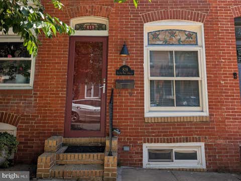 Photo of 819 S Port Street, BALTIMORE, MD 21224 (MLS # MDBA2199506)