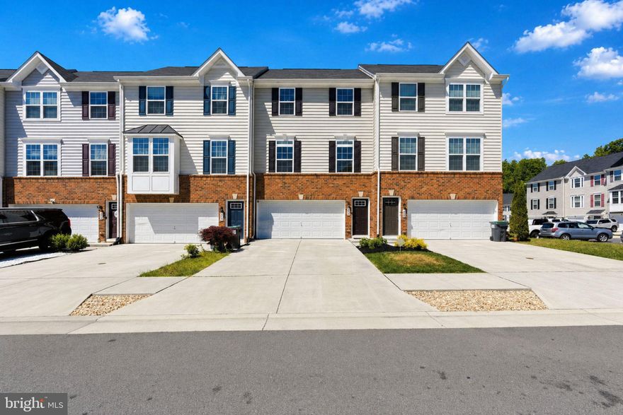 Welcome to 602 Rolling Valley Drive in the highly sought-after Rappahannock Landing community! Built in 2020, this beautifully maintained Colonial-style townhouse offers the perfect blend of modern comfort, thoughtful upgrades, and low-maintenance living in a convenient Fredericksburg location.

Offering approximately 2,772 finished square feet across three thoughtfully designed levels, this home features 3 bedrooms, 3 full bathrooms, and 1 half bath with flexible spaces ideal for both everyday living and entertaining. The open and inviting floor plan is enhanced by hardwood and ceramic tile flooring, abundant natural light, spacious living areas, and an electric fireplace that adds warmth and character to the main living space.

The kitchen flows seamlessly into the adjoining dining and living areas and features upgraded appliances, including a premium Samsung Bespoke refrigerator with smart features and customizable design. Recent interior improvements and design touches throughout the home add style, personality, and functionality, including updated ceiling fans, custom bookcases, and carefully selected finishes that make the space feel truly special.

The fully finished walkout basement provides an additional 924 finished square feet of versatile living space, perfect for a recreation room, media room, home office, fitness area, guest retreat, or additional entertaining space. Upstairs, generously sized bedrooms and upper-level laundry provide added comfort and convenience.

Outside, enjoy the attached 2-car garage, driveway parking, and access to Rappahannock Landing community amenities, including the pool, clubhouse, fitness center, walking trails, trash service, and snow removal. Conveniently located near shopping, dining, commuter routes, downtown Fredericksburg, and I-95, this home offers the perfect balance of comfort, accessibility, and community living.

Schedule your private showing today and experience everything this thoughtfully upgraded home has to offer!