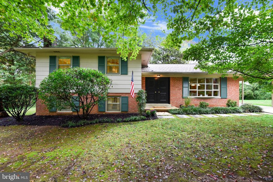 Resting on the quiet end of a cul-de-sac in the close-knit community of Milway Meadows, this five-bedroom split-level home offers comfort and charm, as well as the technology upgrades so essential for today's work-at-home world.  Spacious living and dining areas, all with beautiful oak wood floors, flow seamlessly through the open floor plan on the main level. Two sets of prairie-style French doors lead to both an open deck and a living-room-sized screened porch, all in view from the kitchen.  Bright and sunny, the eat-in kitchen is the beating heart of this home. The big bay window offers a front-row seat to the goings-on outside and is the perfect spot for a large kitchen table. Updated cabinets feature LED lighting above the durable, hygenic silestone counters. The stainless steel appliances include a large French-door refrigerator, a five-burner gas-fired cooktop and exhaust hood, wall oven and microwave.  Upstairs, four bedrooms and two full baths offer a place for everyone, with plenty of closet space. Skylights in the bathrooms add coveted natural light to brighten up the morning routines.   One level down, the whitewashed brick fireplace brings the comforts of home to the recently renovated family room. A fifth bedroom is located here, suitable for an office or media room. The large laundry room and storage area includes a back door to the nearly half-acre lot outside. The covered carport and 14x10 storage shed complete the property, which is also zoned to accommodate the addition of a two-car garage and a second-story master suite.  Throughout this home, the exterior walls have been insulated for weather and the basement interior walls and ceilings insulated for sound. The house is outfitted with high-speed Verizon FiOS, and the rooms are all hard-wired for gigabit broadband and multimedia, including wiring for 5.1 surround sound in the family room. Topping it all off is the 50-year Energy Star-rated roof (installed in 2009), with solar reflective architectural shingles.  It is an easy walk to the outstanding Hollin Meadows Elementary School, the neighborhood swim and tennis club and the Sherwood Hall Regional Library, where a weekly Farmer?s market is held. Nearby, there are plenty of shops and restaurants.  Just minutes to historic Old Town, Reagan National Airport and all that the Greater Metro area has to offer.