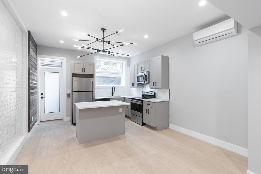 Spacious apartment for lease in Rittenhouse Square! 1707 RITTENHOUSE SQUARE is a historic building from 1840 that has been completely renovated into eight brand new luxury apartments just steps from Rittenhouse Square.  We were able to retain many of the historic features in the common spaces such as the old banister and millwork that give this property its undeniable charm.  The entryway features a modern, yet timeless design that immediately connects you with the past but with a fresh and contemporary perspective.  Private entrance from Latimer st.  9.5  ceilings in main room.  Largest unit in building, only unit with the restoration hardware chandelier, walk in closet, kitchen island, floor to ceiling subway tile in bathroom, original subway tile feature wall in living space, largest bathroom in the building. There are 8  white oak hardwood floors throughout, contemporary gray cabinetry, white quartz countertops, washer & dryer in unit, LED recessed lighting, herringbone subway tile, classic black and white color design themes, sleek black hardware and dramatic tile in the bathroom. The building is equipped with a smart remote entry intercom system that is operable from your smartphone.  Located in the heart of the Rittenhouse neighborhood and steps from Rittenhouse Square this location gives you walkable access to all of the excellent retail, shops, cafes, bars, and restaurants.  All forms of public transit are immediately available and at your fingertips.  This location simply cannot be beaten. This is a brand new unit, be the first to move in!