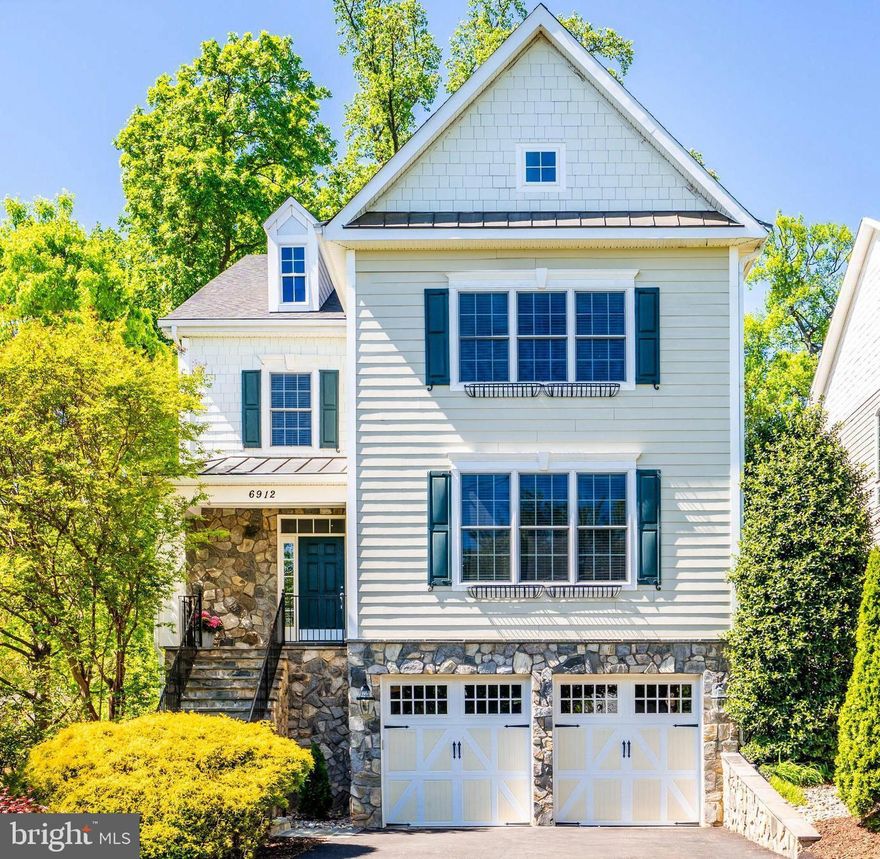 Welcome home to 6912 Willow Street, Falls Church VA, located on a quiet cul-de-sac in
the highly sought-after Haycock/Longfellow/McLean High School pyramid. This
meticulously maintained home features 7 bedrooms, 5.5 baths, and a 2-car garage.
Ideally located approximately half a mile from the West Falls Church Metro station and
minutes from the vibrant Broad Street corridor, you’ll enjoy easy access to a diverse
selection of restaurants, shops and entertainment options.
With over 5,500 square feet of beautifully finished living space, this home was
thoughtfully designed for comfortable living and entertaining. Highlights include sand-in-
place solid hardwood floors, extensive crown and base molding, built-in cabinets and
shelving, wainscoting, and a gourmet kitchen featuring granite countertops, a center
island, stainless steel appliances and a double oven. The open-concept family room
with fireplace flows seamlessly from the kitchen, creating a warm and welcoming
atmosphere. The main level also features a dedicated home office, formal living and
dining rooms, and very spacious bedroom with ensuite bath, ideal for guests or
multigenerational living. Step outside from the main level to a spacious porch with
sliding windows overlooking a beautifully landscaped backyard – perfect for outdoor
dining and relaxing.
Upstairs, the luxurious and spacious primary suite offers a sitting area with a built-in
kitchenette, a California walk-in closet and a bathroom with double shower and jacuzzi,
along with generously sized secondary bedrooms, each with excellent closet space.
A fully equipped media room with a 110” screen, two basement bedrooms and a large
additional family room with wet bar completes this exceptional offering.
This inviting home has it all – space, style and unbeatable location. Don’t miss your
chance to make it yours. Schedule your visit today.