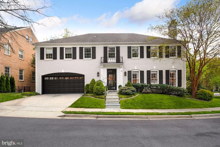 Exquisite Colonial with approx. 10 foot ceilings!  Spacious foyer with guest closet and powder room.   Elegant  living room with gas fireplace, hardwood flooring, crown molding , floor to ceiling windows, adjacent to lovely dining room with floor to ceiling window, hardwood floors and French doors leading to patio and garden. Gourmet cooks kitchen with top-of-the-line stainless steel appliances,  granite counters and backsplash,  island with seating, pantry and French doors leading to patio.  Breakfast room or sitting room with bay window and hardwood flooring.  Family room with built-in bookcases, gas fireplace, hardwood flooring and French doors to patio. Direct access to Attached 2 car garage. 
The second level boasts  a large sun-filled primary suite with updated, elegant marble bath w/separate shower, two large walk-in closets, +2 additional closets.  
# 2 Bedroom  has a bath en-suite, large 3rd and 4th bedrooms share a Jack and Jill bath. In addition, there is a laundry room, and attic. 
The lower level features a huge recreation room with wet bar, ample storage, wall-to-wall carpeting, bedroom, bathroom, utility room with second laundry and ample storage. 
Gorgeous, professionally landscaped , fenced garden with patio!  Perfect for entertaining!