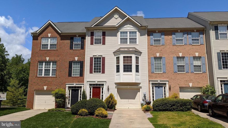 Piney Orchard has tons of amenities.  This home has a premium lot with a FENCED IN YARD and beautiful Deck!  The lot backs up to trees and open area which provides great privacy. The main level offers a large family room,  a den with easy access to the fenced-in backyard, a half bath, and a laundry room. Upstairs you'll enjoy a comfortable and spacious living room & dining room area with bay windows.  There's also a gourmet kitchen with a center island that opens to a breakfast room and a sun room addition with sliding doors to your private deck with privacy trees. The top level offers a large master suite with vaulted ceilings and a sitting area.  It also provides a large walk-in closet and a luxury bath plus two additional bedrooms with vaulted ceilings and a second full bath.