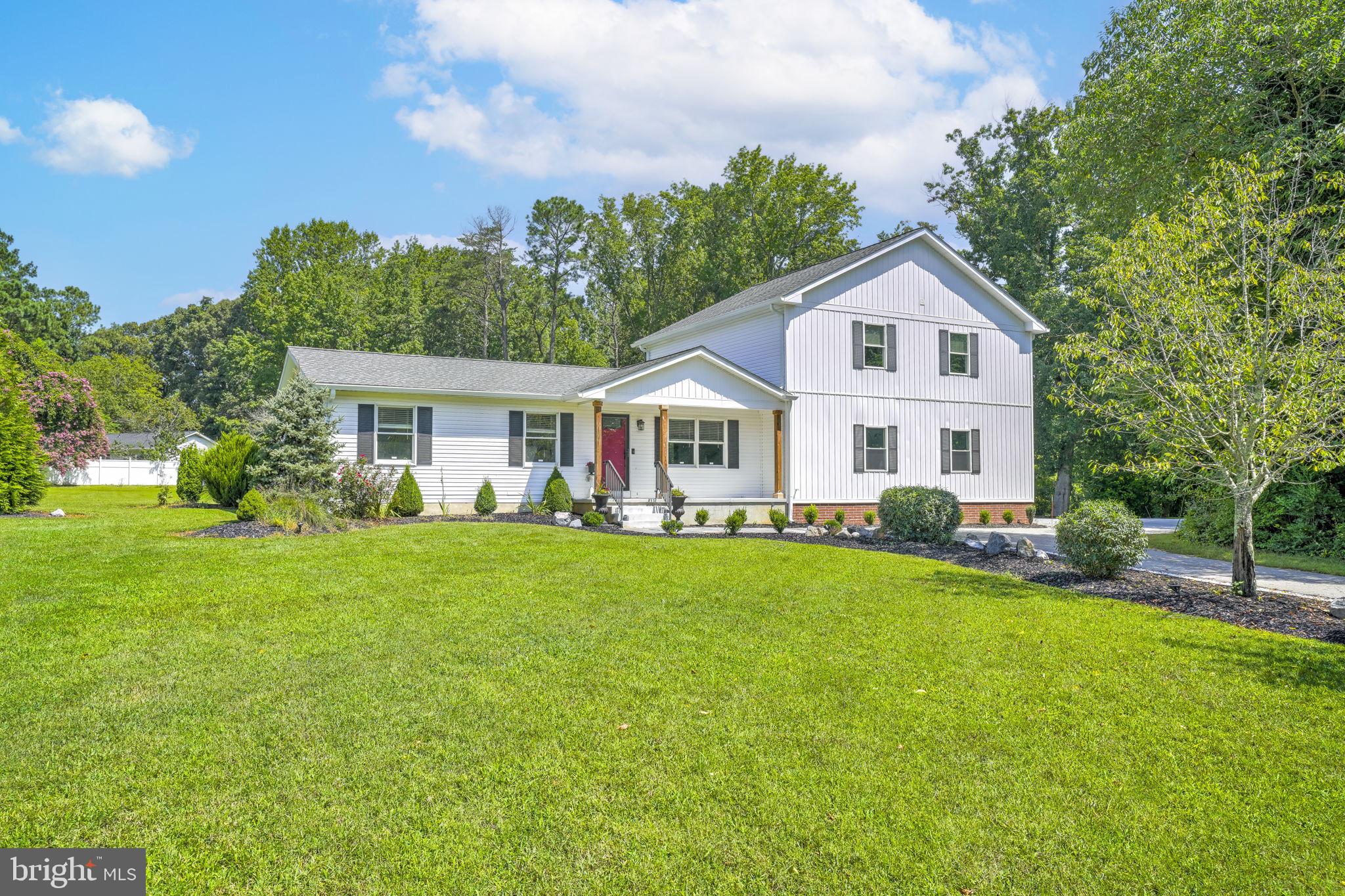 Private 5-Bedroom Home Near Patuxent River – Minutes from Parks, Towns & Water Access. No HOA.
Tucked away in a peaceful, private setting, this spacious 5-bedroom, 3-bathroom home offers a rare combination of seclusion and convenience. Located just one mile from the Patuxent River and boat ramp access, and right down the street from Greenview State Park with its beach and scenic trails, this home is also close to Leonardtown, Solomons Island, and Dorsey Park.
From the moment you arrive, you’re greeted by a beautifully landscaped entrance featuring two spiral evergreen trees and a stone circle filled with white marble rock. With over $5,000 invested in trees, flowers, and shrubs—including Green Giant and Emerald Arborvitae, roses, snapdragons, crape myrtle, hydrangeas, ornamental grasses, boxwoods, wildflowers, and wild raspberry bushes—the curb appeal is truly stunning.
The oversized driveway provides plenty of parking and easy maneuvering for multiple vehicles, all located along the side of the home for a clean, elegant front view. White marble rock lines the driveway for both aesthetic and drainage benefits.
The backyard is a showstopper—cleared, graded, and mostly enclosed by a 6’ white vinyl privacy fence, offering a flat, grassy area ideal for entertaining, pets, or play. A wood-built shed with a shingle roof and dual lean-to sides offers convenient, covered storage for lawn equipment.
Inside, the home is filled with thoughtful details and modern touches. The kitchen features marble countertops, a deep farmhouse sink, LED under-cabinet lighting, and stylish black hardware throughout. The upstairs family room boasts 14’ vaulted ceilings and a unique 1800s hand-hewn oak beam mantle salvaged from a historic tobacco barn in nearby Chaptico. A hidden entertainment center includes a conduit for discreet cable management and tech organization.
Key Updates & Features Include:
5 Bedrooms / 3 Bathrooms
Brand new HVAC unit (2025) for upstairs + both systems serviced June 2025
New architectural shingle roof (2023)
Whole-house sediment + UV light water filtration system
New well pump and expansion tank (2023)
Electric fireplace with multiple flame and color settings + heat function
WiFi-enabled garage door openers
High ceilings in the garage
Oversized driveway and side-facing garage for clean curb appeal
Addition was completed in 2023
This beautifully upgraded property offers space, privacy, and unbeatable access to nature, water, and charming Southern Maryland towns. Schedule your private showing today.