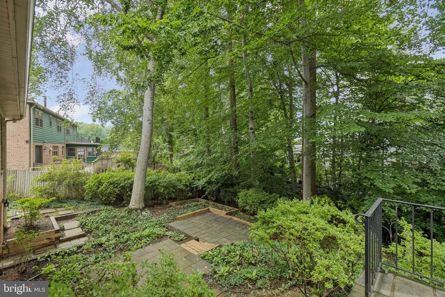 Wonderful Private Retreat, soooo close to DC. Take advantage of fall reduced pricing! Great price on this spacious home that the owner is eager to get home leased. This beautiful home has had several major renovations this spring and is now ready for new tenants! Spacious and Elegant.  Wonderful quiet Chain Bridge Forest location and just one stoplight to DC! Spread out in this almost 4,000 square foot home. Circular first floor plan with Embassy sized rooms.  Floor plans under "documents" or by request. Living room with marble surround fireplace, floor to ceiling windows next to the separate formal dining room. The kitchen features stainless steel appliances, quartz counters and cherry wood cabinets. Dramatic lighting and table eating space, plus breakfast bar. There is a step-down family room off the kitchen where you will find the second wood burning fireplace along with rear access to the slate patio. There is also a private main level office just off the foyer with built-in shelving and storage. The laundry room is located on the main level, along with a half bath and direct access to the oversized two car garage! Upstairs are four large bedrooms one in each corner of the home. The upper level hall way is open and wraps around the exposed main staircase. The owner's suite has been extensively renovated with marble step in shower, separate vanity and private room for the water closet. The owner's bedroom has a walk-in closet, plus a second wall closet. The lower level is a walk-out to a lower rear yard patio and boasts a large pub-themed rec room with wet bar plus an oversized bonus room. The third full bath is also on the lower level along with the third wood burning fireplace.  Roof recently replaced. There is an abundance of storage options on the lower level! Beautiful teak inlaid floors in many of the oversized rooms. Level front yard, quiet, no thru Street and close-in convenient location. Great rental home and pets case by case.  Schedule your showing today!