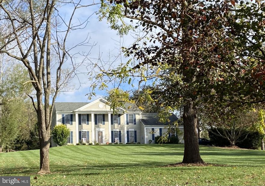 Well-maintained 4 bedroom, 2 & 1/2 bath 2,400 square foot home on  a 1.4 acre corenr lot. Harwood floors throughout most of main level, large rooms including separate office and laundry/mud rooms. Features include wood trim details, brandnew carpet, and a huge rear deck. The primary bathroom was totally remodeled to include heated slate flooring, skylights, jacuzzi tub and large glass wall shower. Newer roof and appliances, walk-up, unfinished basement, and oversized, attached two-car garage. Located just minutes from Charles Town, Harpers Ferry and Shepherdstown.