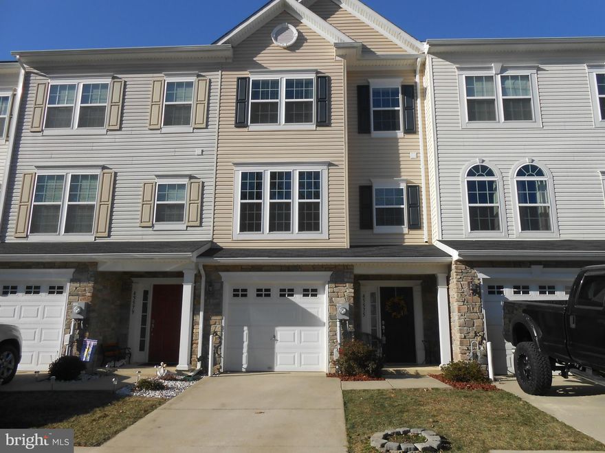 Beautiful 3 fully finished level townhome in Beverly hills. Hardwood floors on main level. Kitchen has a super pantry with island and office area. Fully finished basement, 1 car garage and a fenced backyard to die for!! Separate family room and living room. Lots of room here. Very well taken care of.  24 hour notice if possible because of a pet.