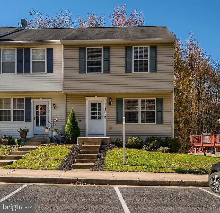 Gorgeous open floor plan 3 Bedroom, 1.5 bath end of group townhome in Harford Town. Deck overlooking wooded back yard, walking distance to community pool and playground. Fully updated home with 2 new tiled bathrooms, stainless steel appliances and new flooring throughout. 100% move in ready! Conveniently located close to I95 & APG. Unfinished walk out basement is open and ready for your finishing!