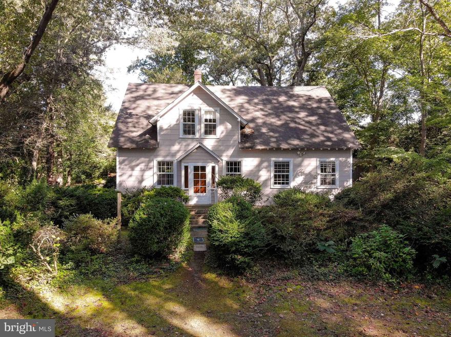 SHOWINGS TO BEGIN FRIDAY 9/22!  Welcome to 3559 Patuxent River Road, Davidsonville, Maryland. This 3 acre heavily wooded property has the most beautiful, mature oak trees some larger than 5' in diameter, that make it a 100% private setting in the country. The house has a lovely, unique cottage feel and with some updating will be a charming home for a young family or a couple who loves privacy. There are four bedrooms with one bedroom on the main floor and two bathrooms. The house has a kitchen, living room, and a large family/music room. There is also a large basement to have exercise equipment or storage. Outside the home are three sheds making the property a perfect one for someone with a business which requires housing of equipment and tools. Any additional outbuildings can be placed away from the home, in either of the fields pictured, keeping the home private from any type of business. Come and see this charming, private home knowing it is in a great area with wonderful schools and a beautiful Maryland countryside. Properly done this would feel this is a wedding venue.