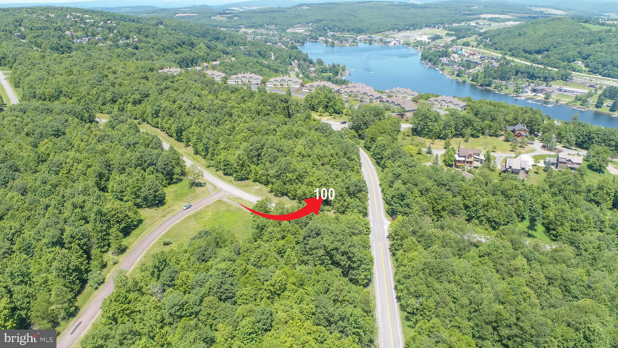 Prime mountain homesite in the Highline community @ Deep Creek Lake! Discover the perfect place to build your dream retreat in the heart of one of Deep Creek's premier mountain resort communities. This scenic 0.57-acre homesite offers an exceptional balance of everyday convenience, recreational opportunity, and year-round adventure – all in an unbeatable mountaintop location. Ready for your custom build, this resort lot includes water / sewer taps and offers community paths leading to the Wisp Ski Slopes—making it easy to hit the powder whenever you please. Embrace the mountain-resort lifestyle with true four-season living, from skiing and hiking to boating, golfing, and more. Nearby attractions include the ASCI Whitewater Course for thrilling outdoor adventures, Lodestone Golf Course for championship-level golf, and Deep Creek Lake State Park for fishing, swimming, and waterfront fun. Whether you're planning a vacation retreat or a full-time mountain sanctuary, this lot is the ideal starting point to bring your vision to life.