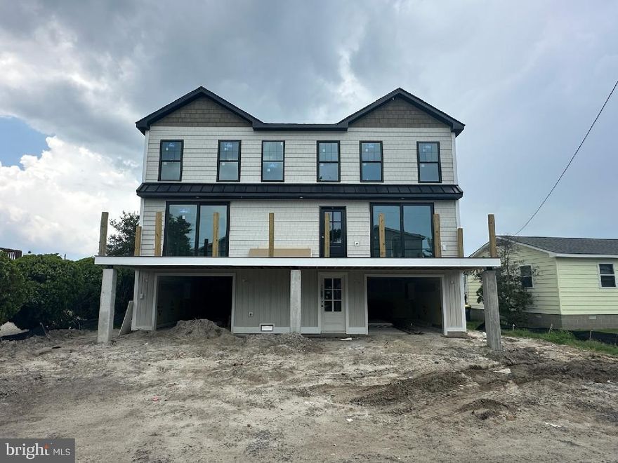 Beautiful canal front custom-built home.  Estimated delivery date late October.
Extensive hardscape, custom tiled bath's, paint colors, LVP, flooring, build in closets and pantry, stainless appliance package, electric fireplace, spaces decks, screened porch area, built in cabinets outside, outside shower, 2 large garage's and much more. This home is a must see.