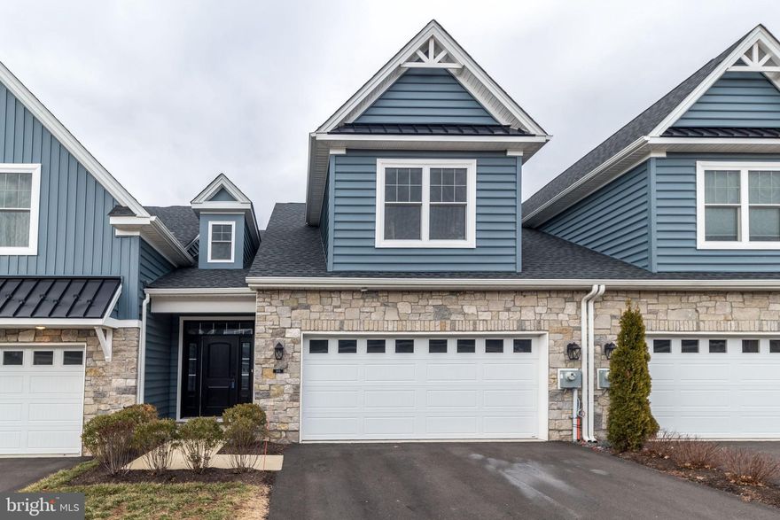 Fabulous opportunity to own a less than two year old townhome in a small, meticulously maintained 55+ community, just minutes from anything you might need! Welcome to 906 Holden Court, where comfort and quality have met to provide you with the best in maintenance free living. Beautiful engineered  hardwood floors run throughout the home, with the main floor flowing from the foyer to a gourmet kitchen, with quartz island and countertops & gas cooking. A large living area with an electric fireplace opens from the kitchen, off of which is perhaps the best feature of the first floor...  the bright and cheerful sunroom, and patio,  where you can enjoy morning coffee, quiet workspace, and long afternoons reading!  The primary bedroom, off of the living area, has two closets and a full bathroom, with a double sink vanity and  marble floors.   Finishing off the main floor is a half bathroom, and a laundry room that connects the home to the two car garage.  Up the wood staircase is a wonderful, multi-purpose loft area, off of which are two large bedrooms and a full bathroom. With great shopping, restaurants and transportation just minutes from the neighborhood, as well as easy access to major highways, this location is beyond convenient. The current owners are sad to be leaving after such short time, but excited to move closer to their family! Make your appointment today, or stop at our open house, Sunday, March 9 from 12-3 pm.